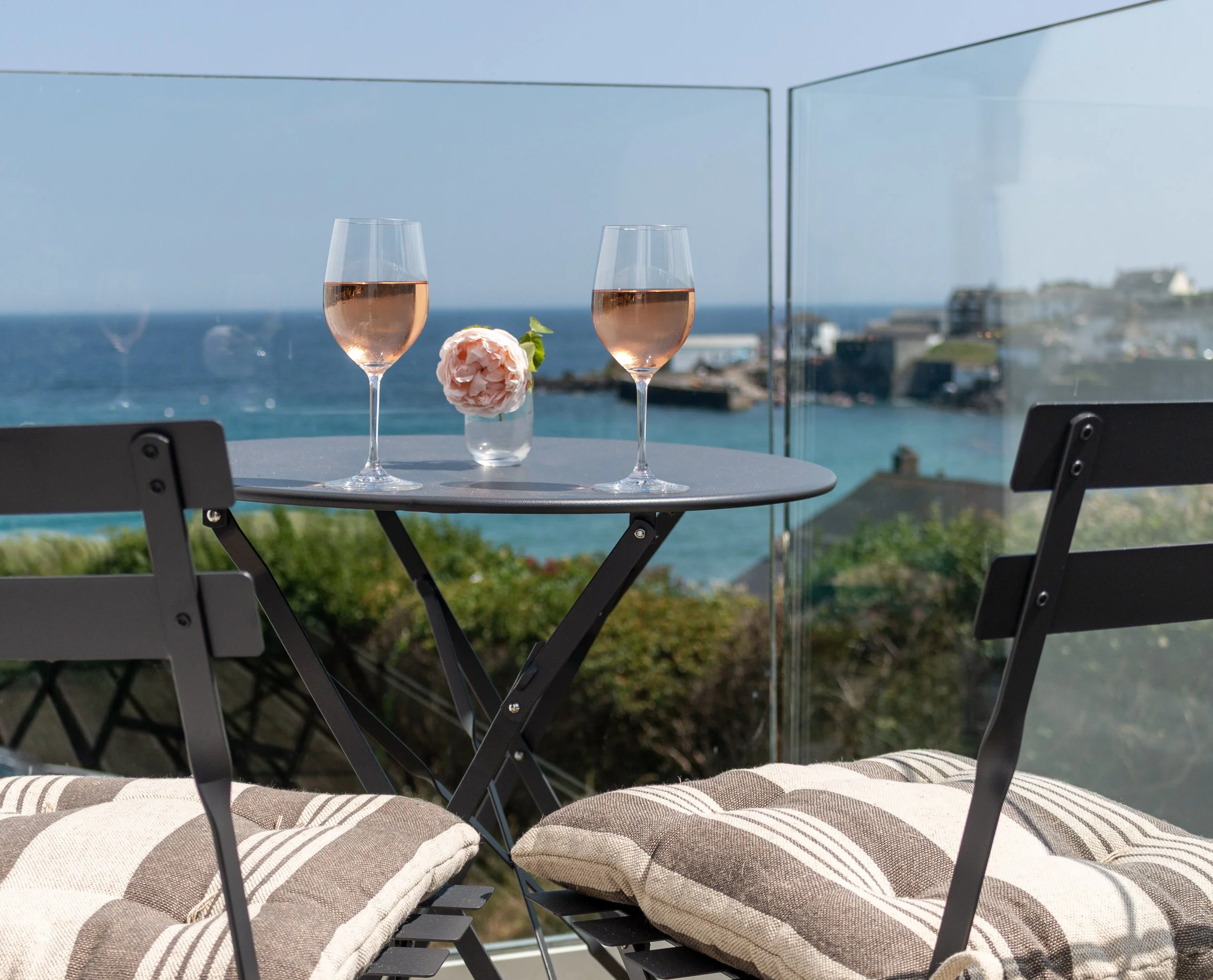 Glasses of rose on the balcony of the Harbour Suite