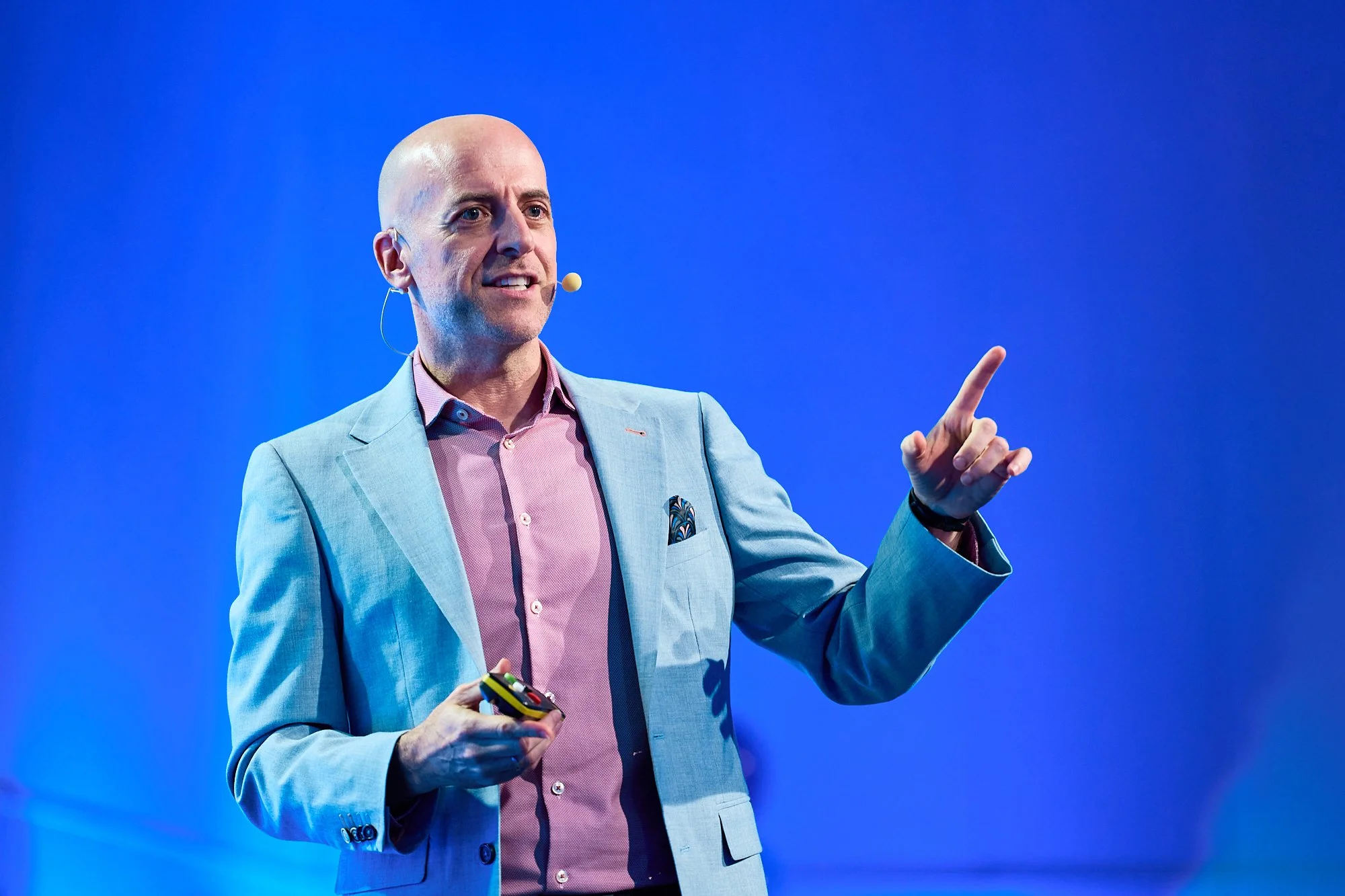 live-event-speaker-on-stage-gesturing-portrait.jpg