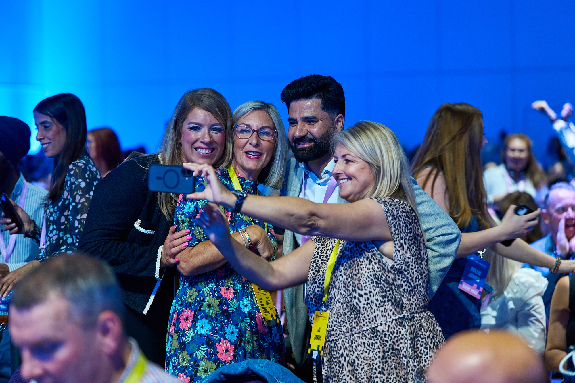 corporate-event-sofia-audience-taking-photos-having-fun.jpg