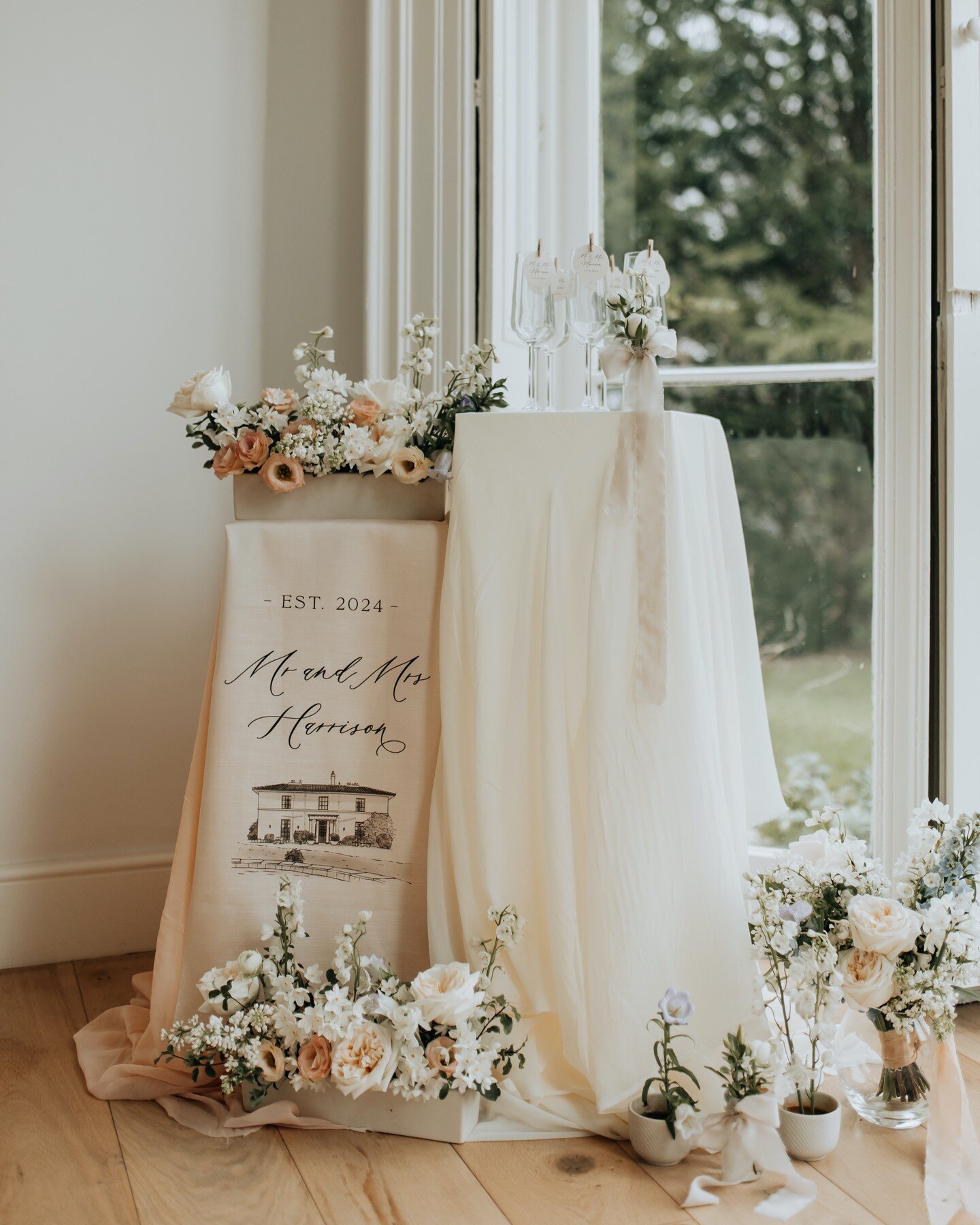 I'm absolutely *loving* fabric signs for 2024! Not only are they super portable (hello destination weddings! ✈️) but they look super elegant when draped with fabric amongst your beautiful wedding flowers 🌸 

Add a custom venue drawing, or keep it si