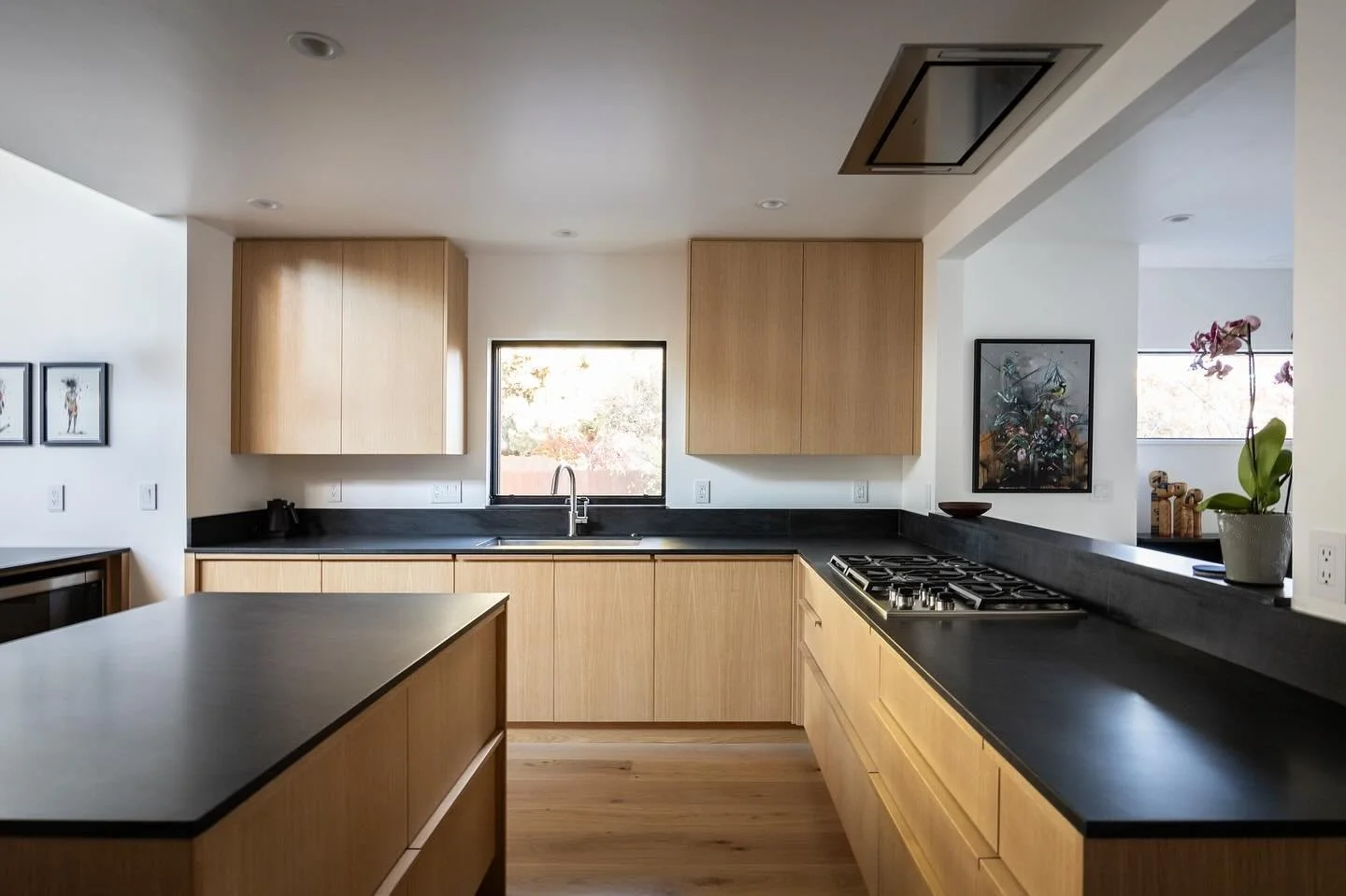 Imagine preparing your Thanksgiving feast in this warm, modern kitchen from our recently completed project in downtown Bend. With natural soapstone countertops, rift oak cabinets, and a generous prep island, it&rsquo;s designed for effortless cooking