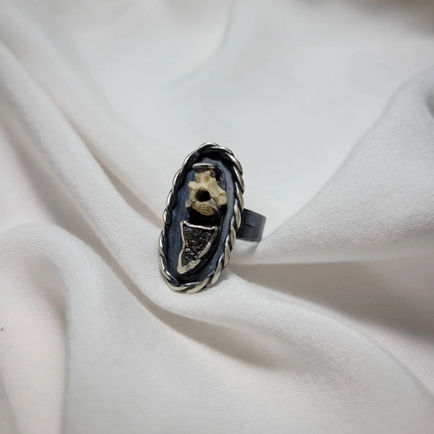 Squirrel vertebrae, unknown stone, sterling silver. size 6.5. $180.