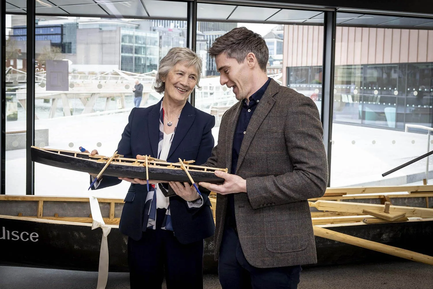 President Connolly Lauches Currach boats on the River Liffey