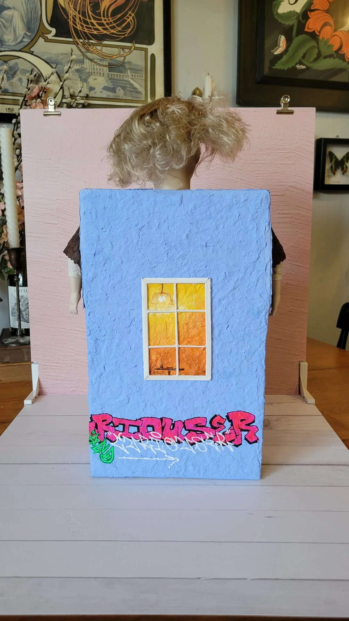 "Curiouser and curiouser" (back view) Alice In Wonderland inspired papier-mache trinket shelf house - papier-mache, recycled materials, porcelain doll, hand painted. March 2026