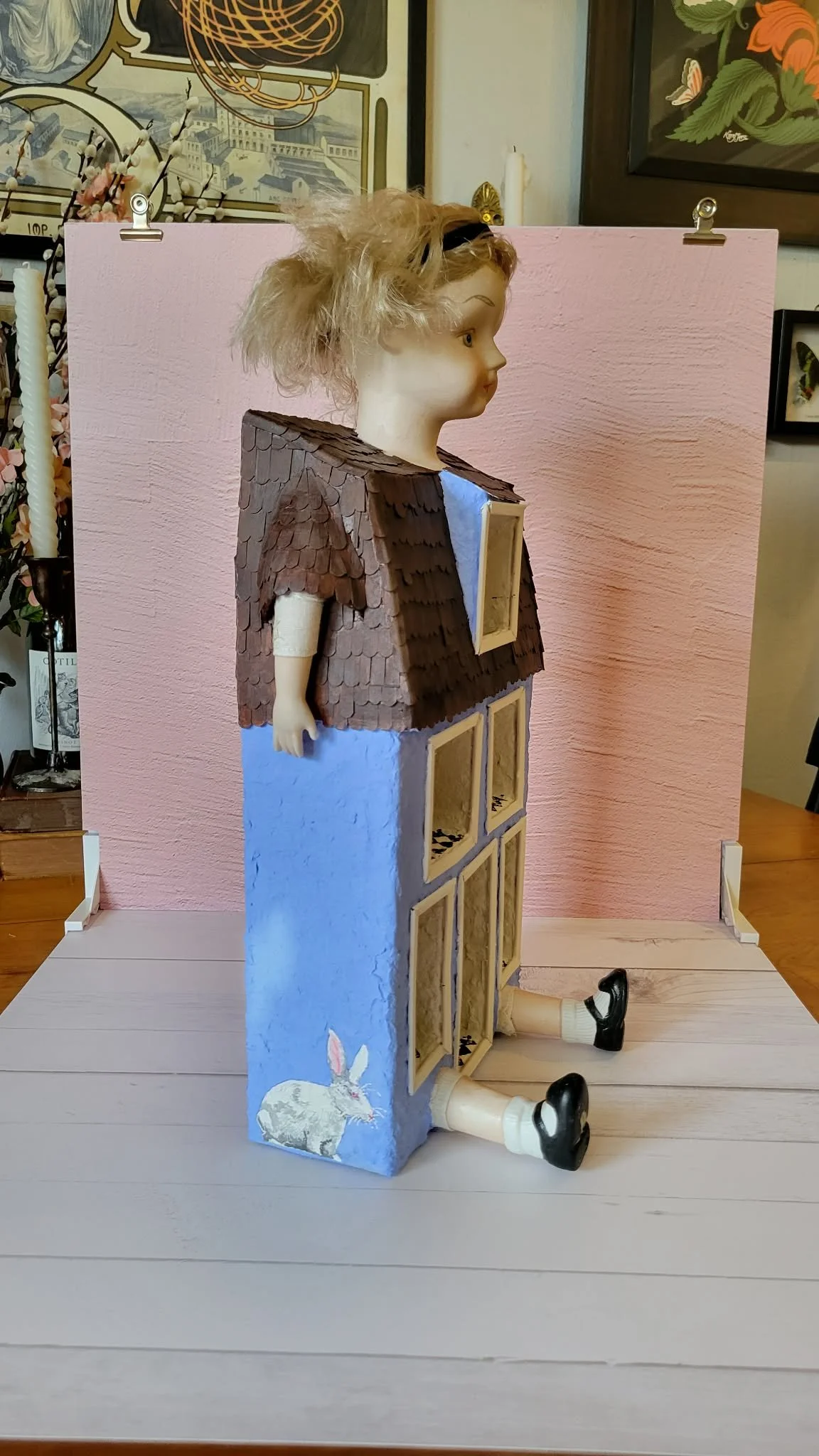 "Curiouser and curiouser" (side view) Alice In Wonderland inspired papier-mache trinket shelf house - papier-mache, recycled materials, porcelain doll, hand painted. March 2026