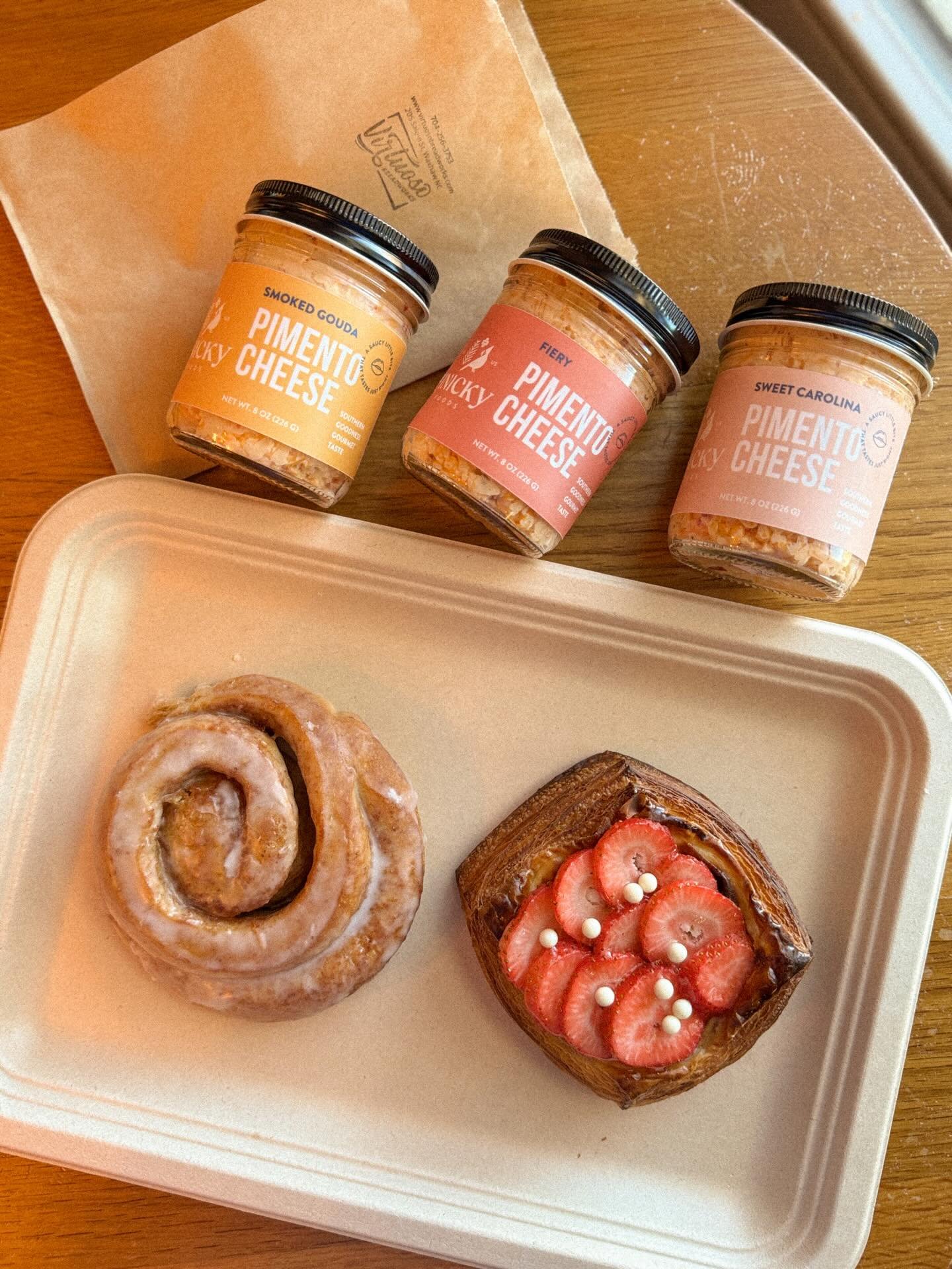 Come for Pastries / Leave with Pimento Cheese 🧀🍓🥐

JARS IN STOCK! ♨️ Smoked Gouda 🧄 Sweet Carolina 🌶️ Fiery

DID YOU KNOW? When the mood hits, the smart bakery brains at @virtuosobread will use our pimento cheese in their bagel bombs, focaccia o