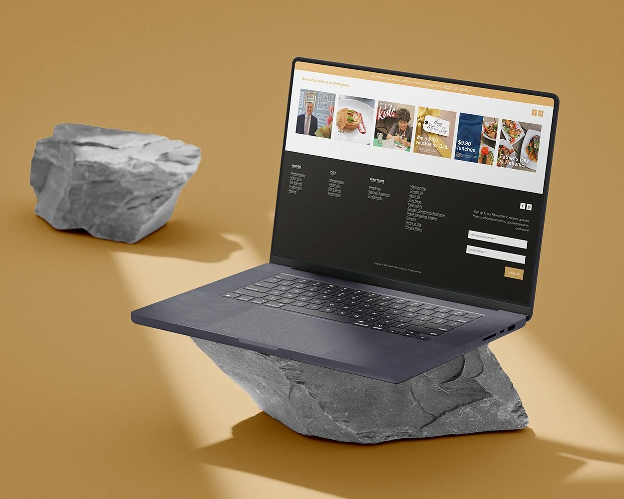 Raego Creative - Hellenic Club of Canberra  Custom Website Design Macbook on Rock.jpg
