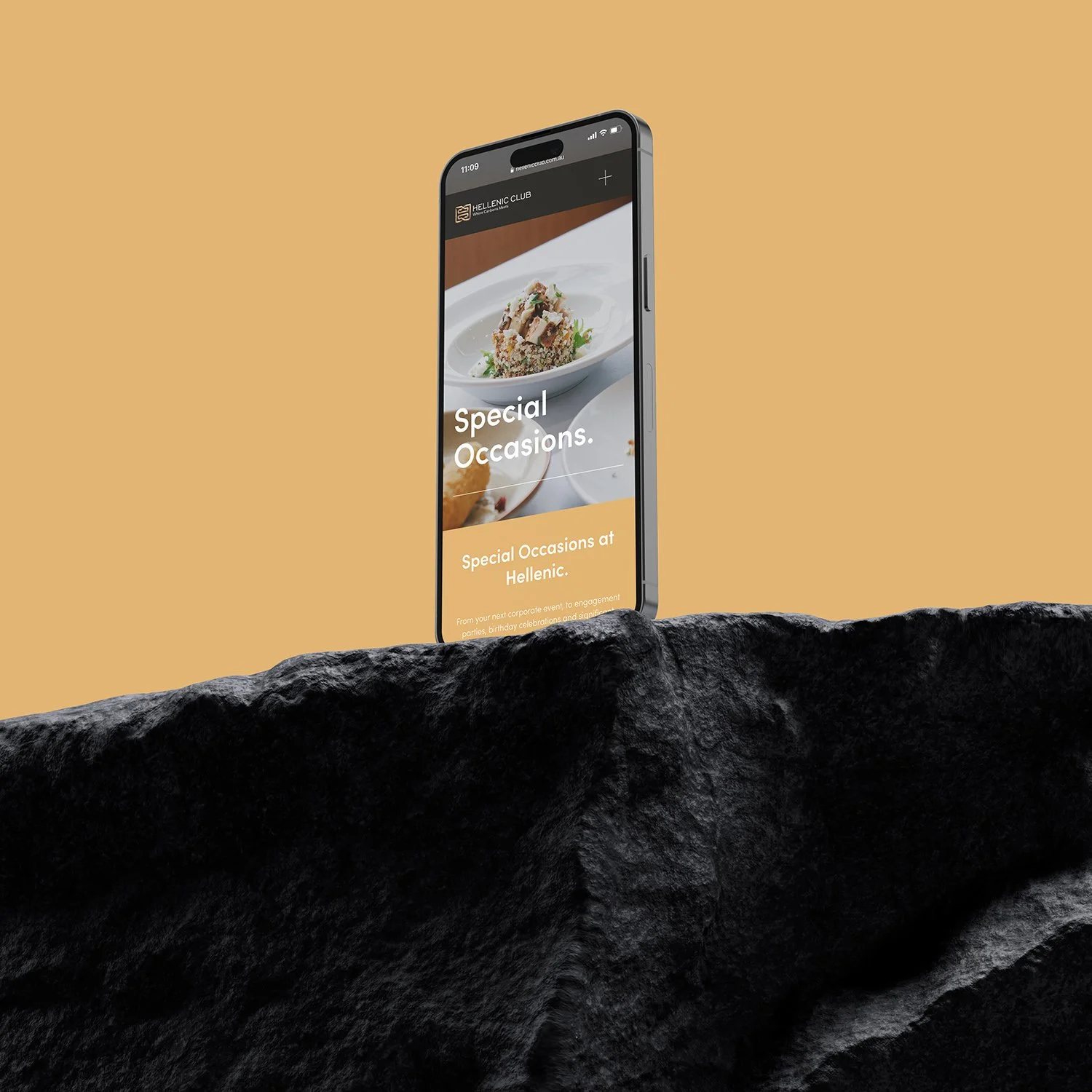 Raego Creative - Hellenic Club of Canberra  Custom Website Design iPhone standing on rock.jpg