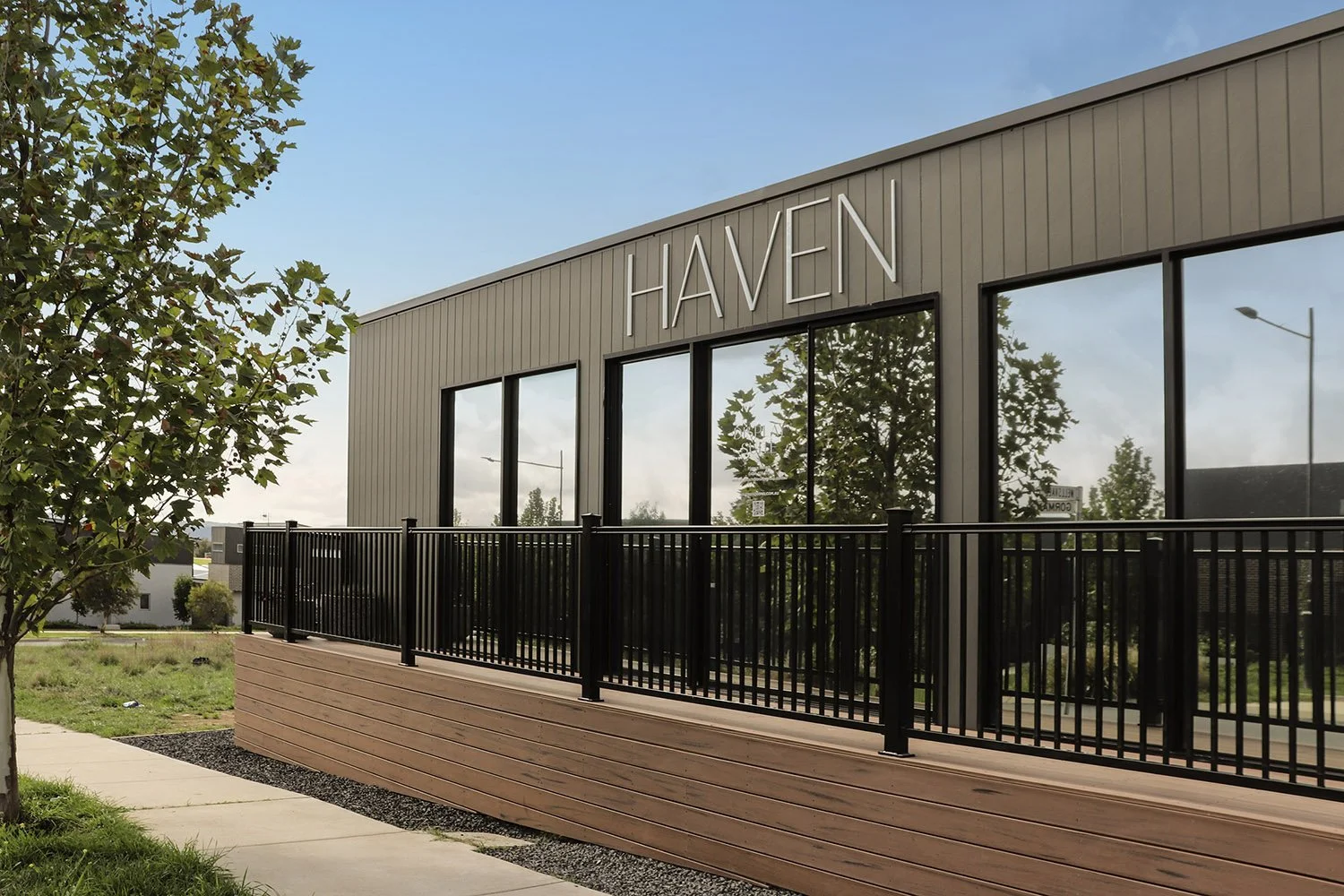 Raego Creative Haven Googong Development Logo on Display Suite Facade.jpg