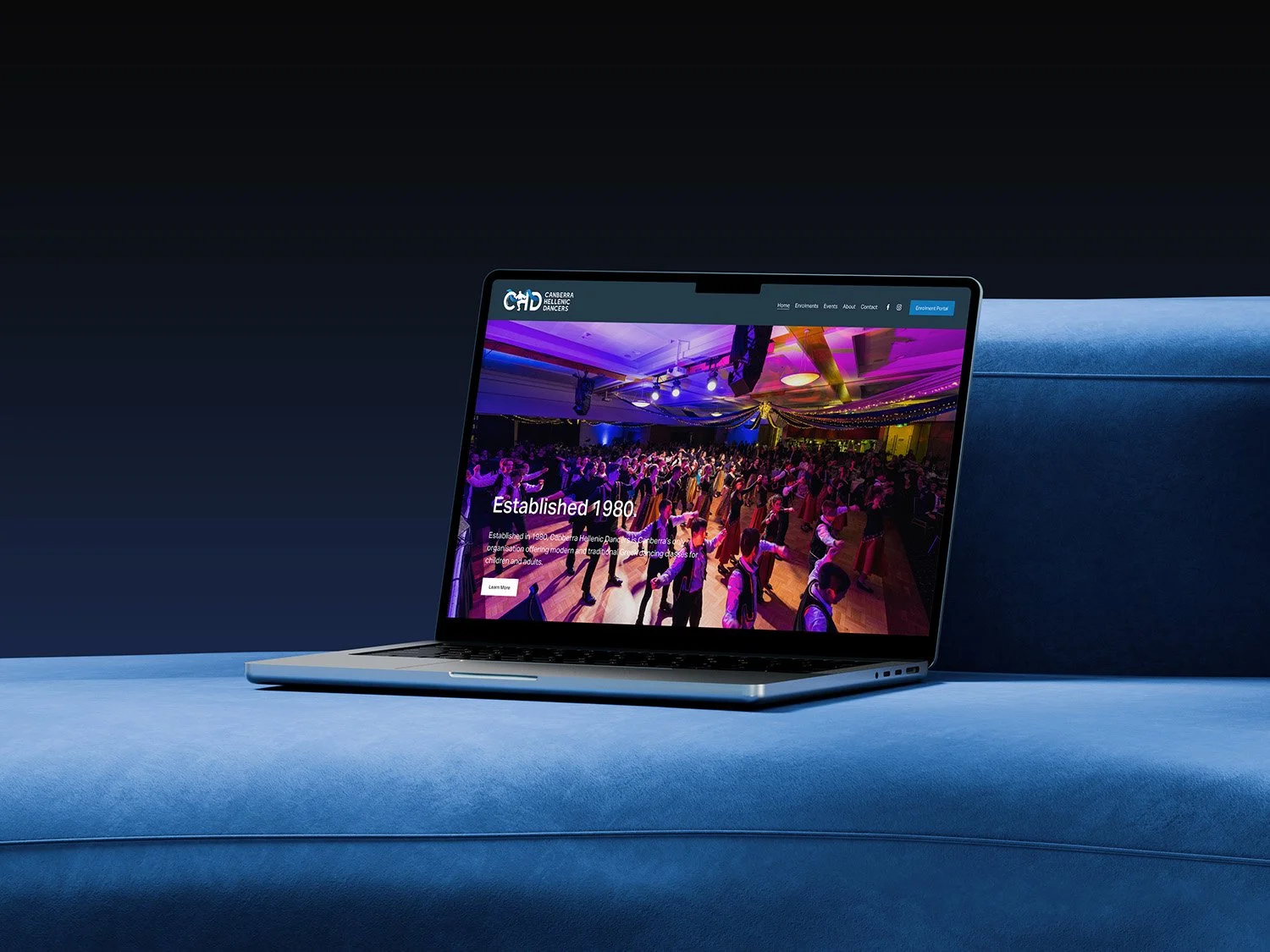 Raego Creative Canberra Hellenic Dancers Website Design Macbook on Couch.jpg