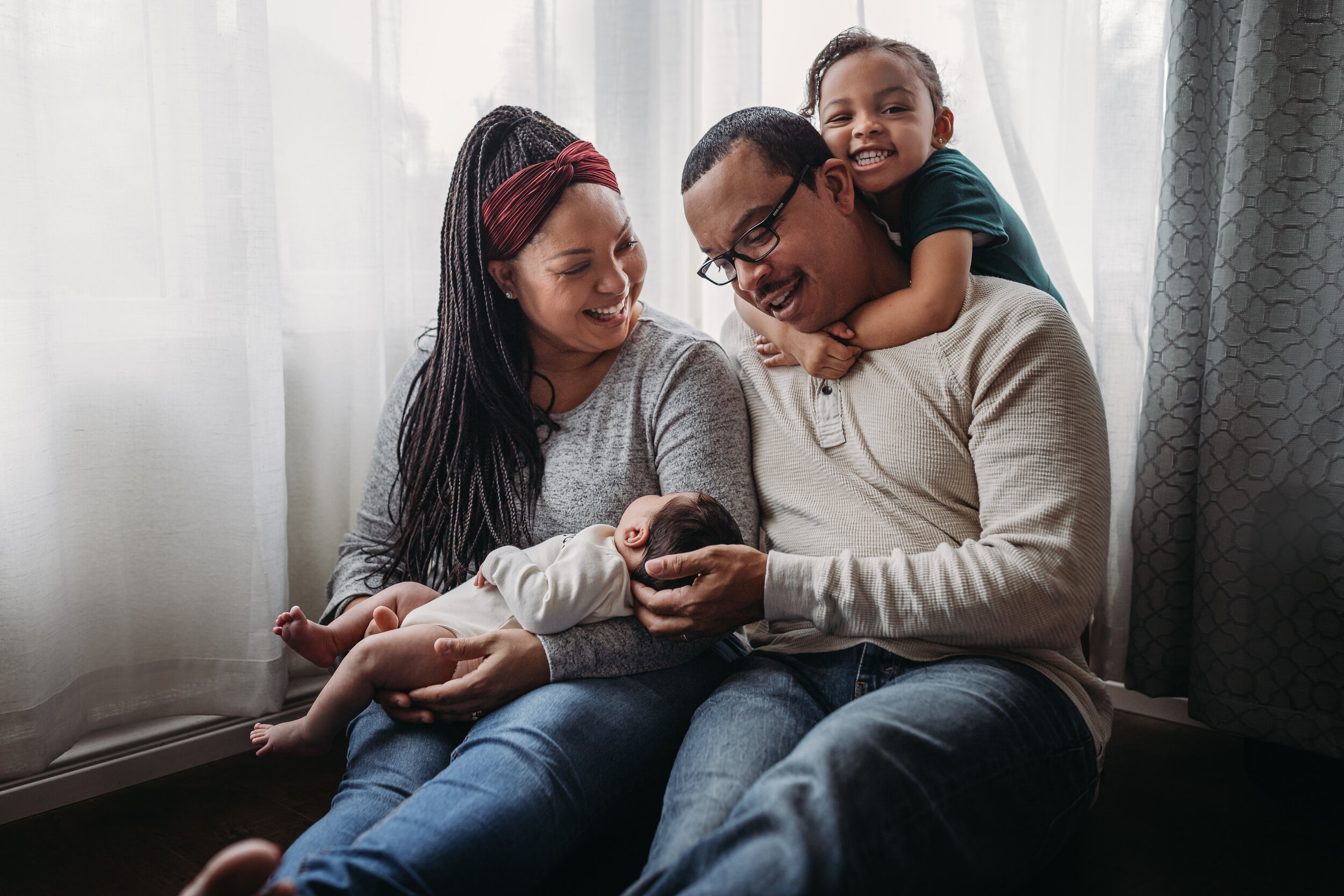 Lifestyle Newborn Photos in  clients Home with Baby Boy and family photo and outfit ideas