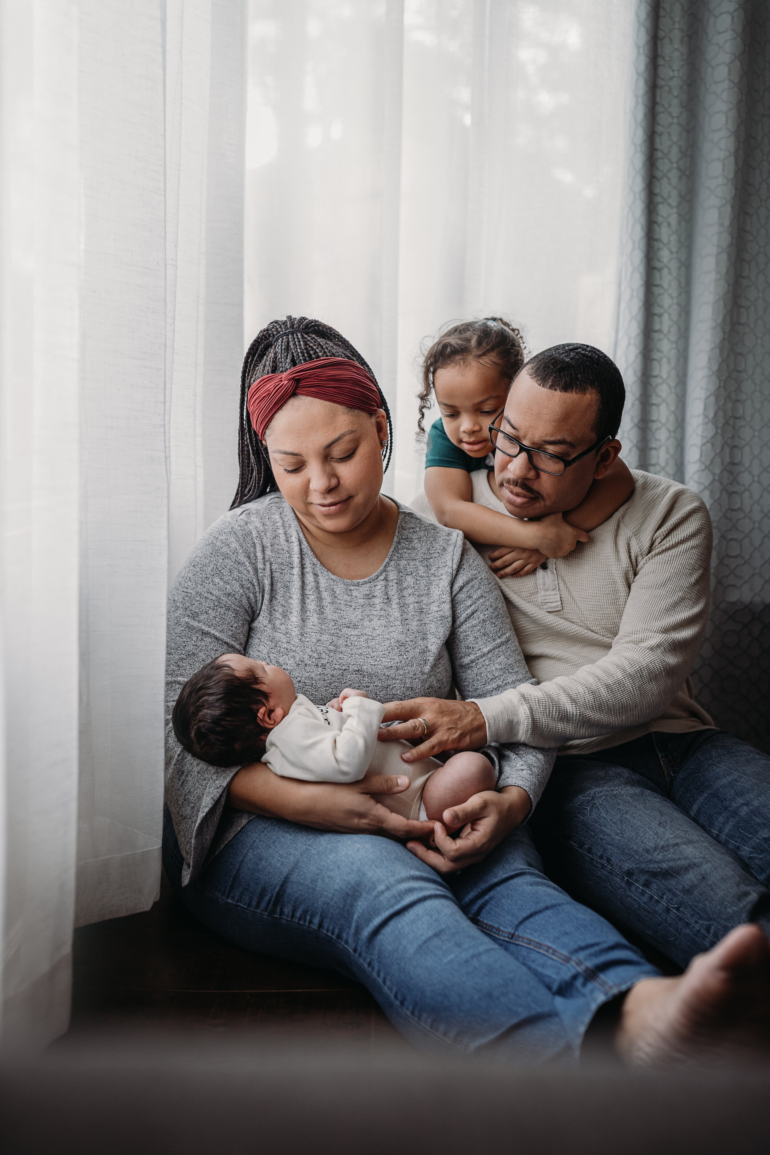 Lifestyle Newborn Photos in  clients Home with Baby Boy and family photo and outfit ideas