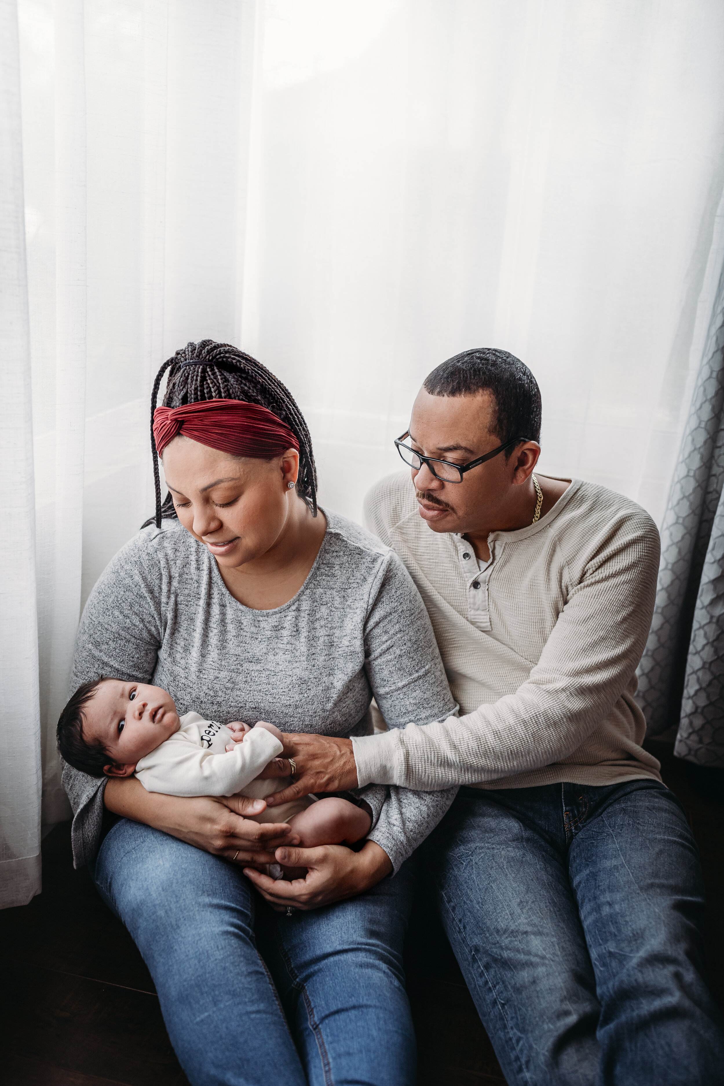 Lifestyle Newborn Photos in  clients Home with Baby Boy and family photo and outfit ideas