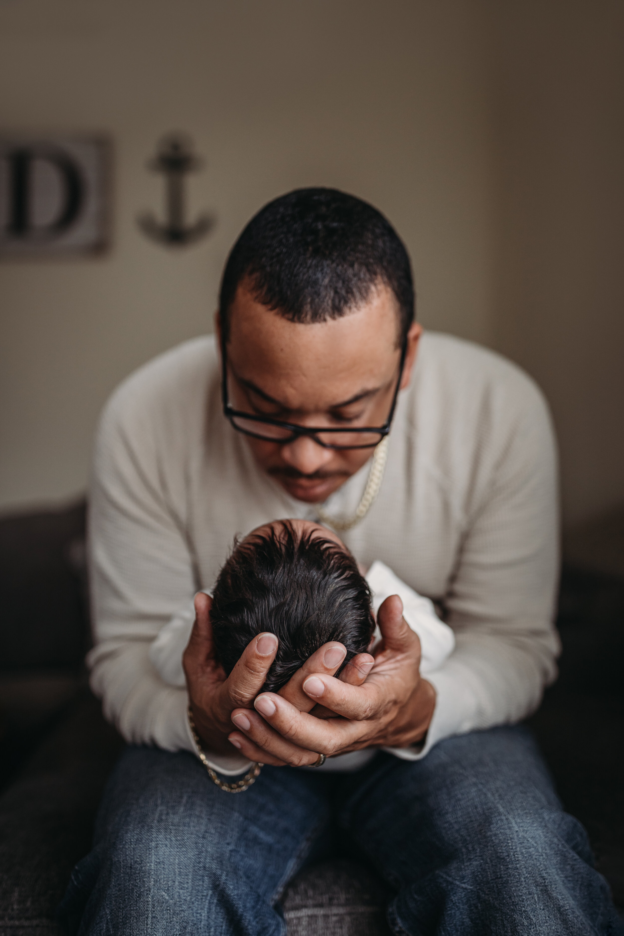 Dad and newborn - Lifestyle Newborn Photos in  clients Home with Baby Boy and family photo and outfit ideas