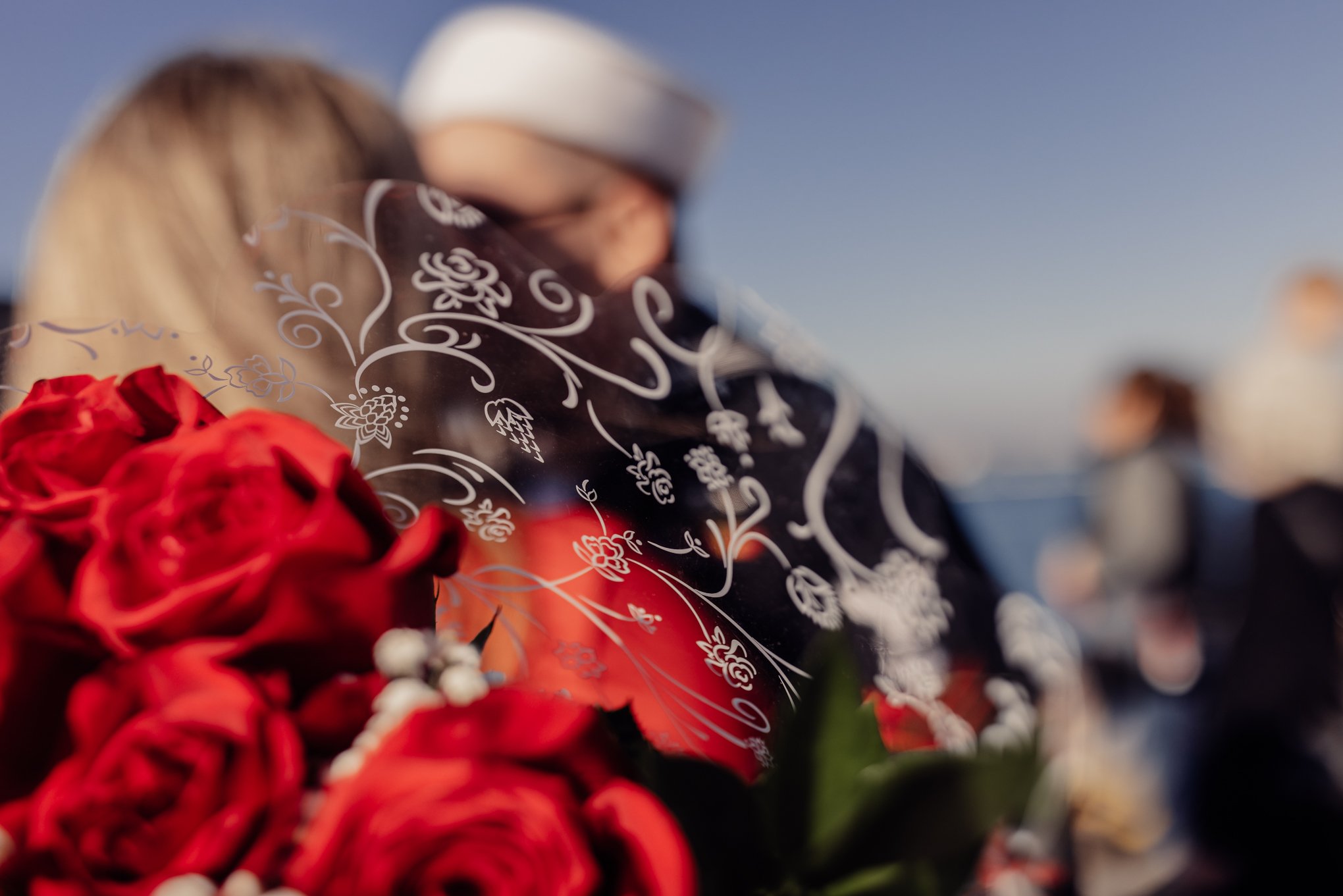 Upclose photo of roses at navy Homecoming 