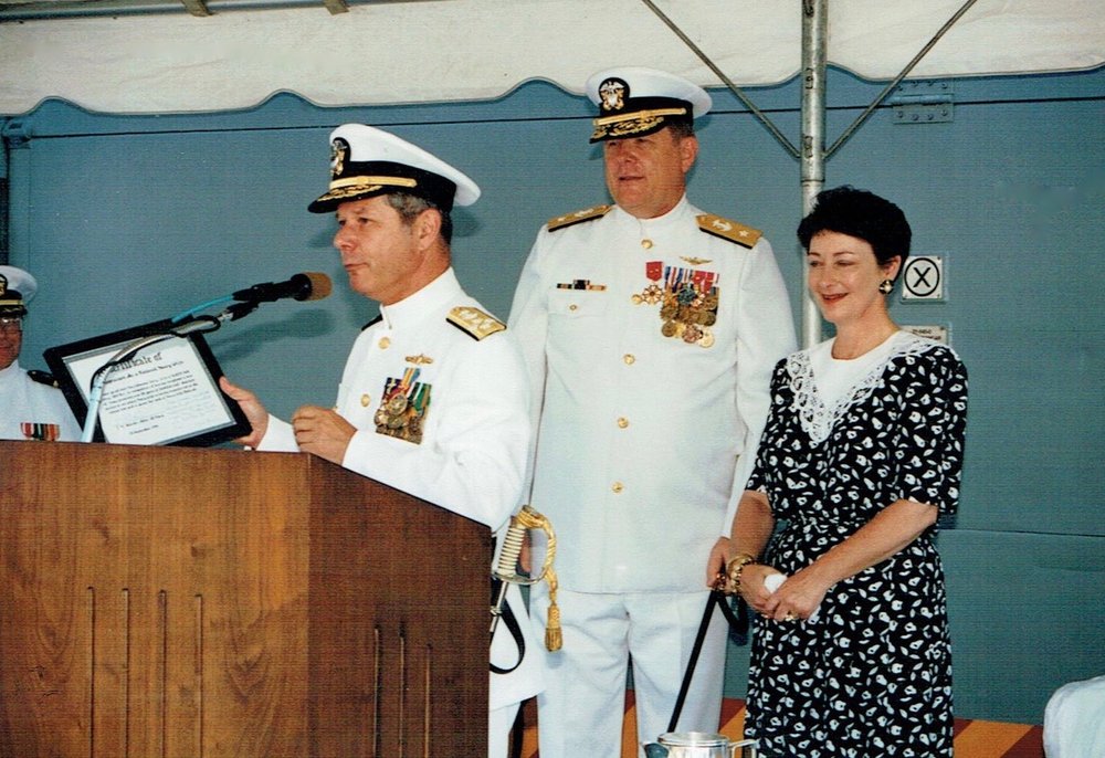 Chief of Naval Operations, Admiral Mike Borda presenting award to Johanna Terry