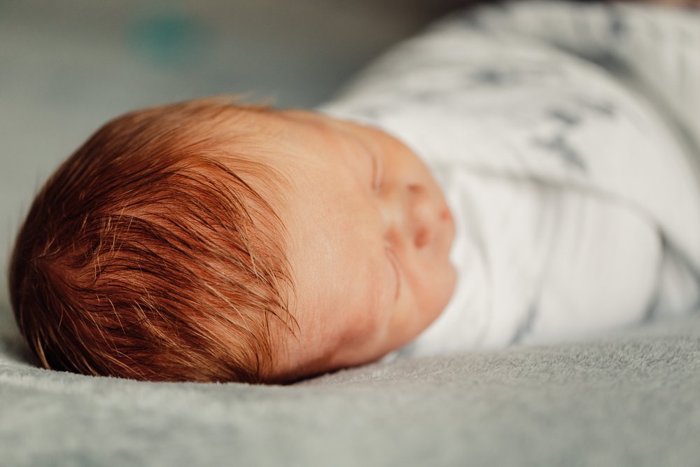  San Diego Newborn Lifestyle and birth Photographer red headed boy 