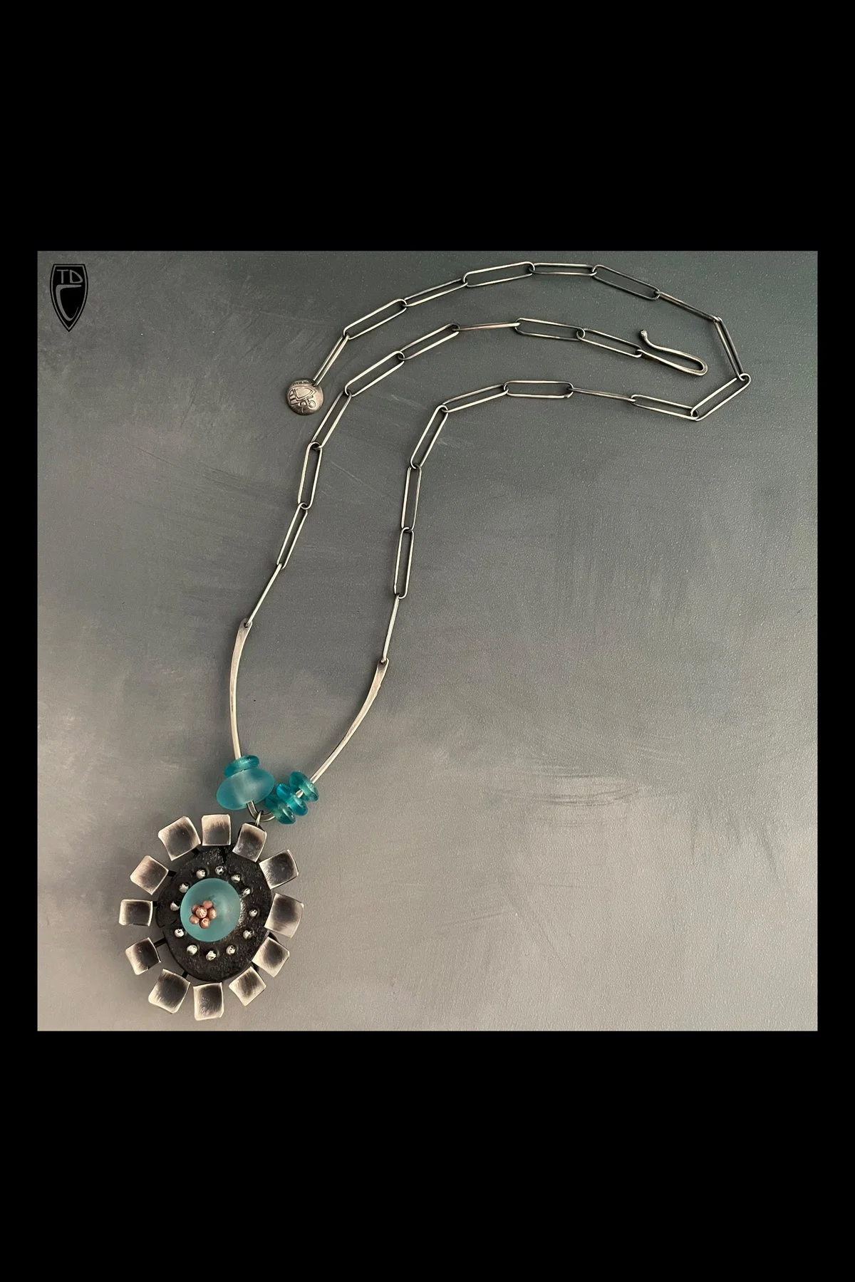 "Yearn", Sterling Silver, Bronze and Glass Floral Form Necklace