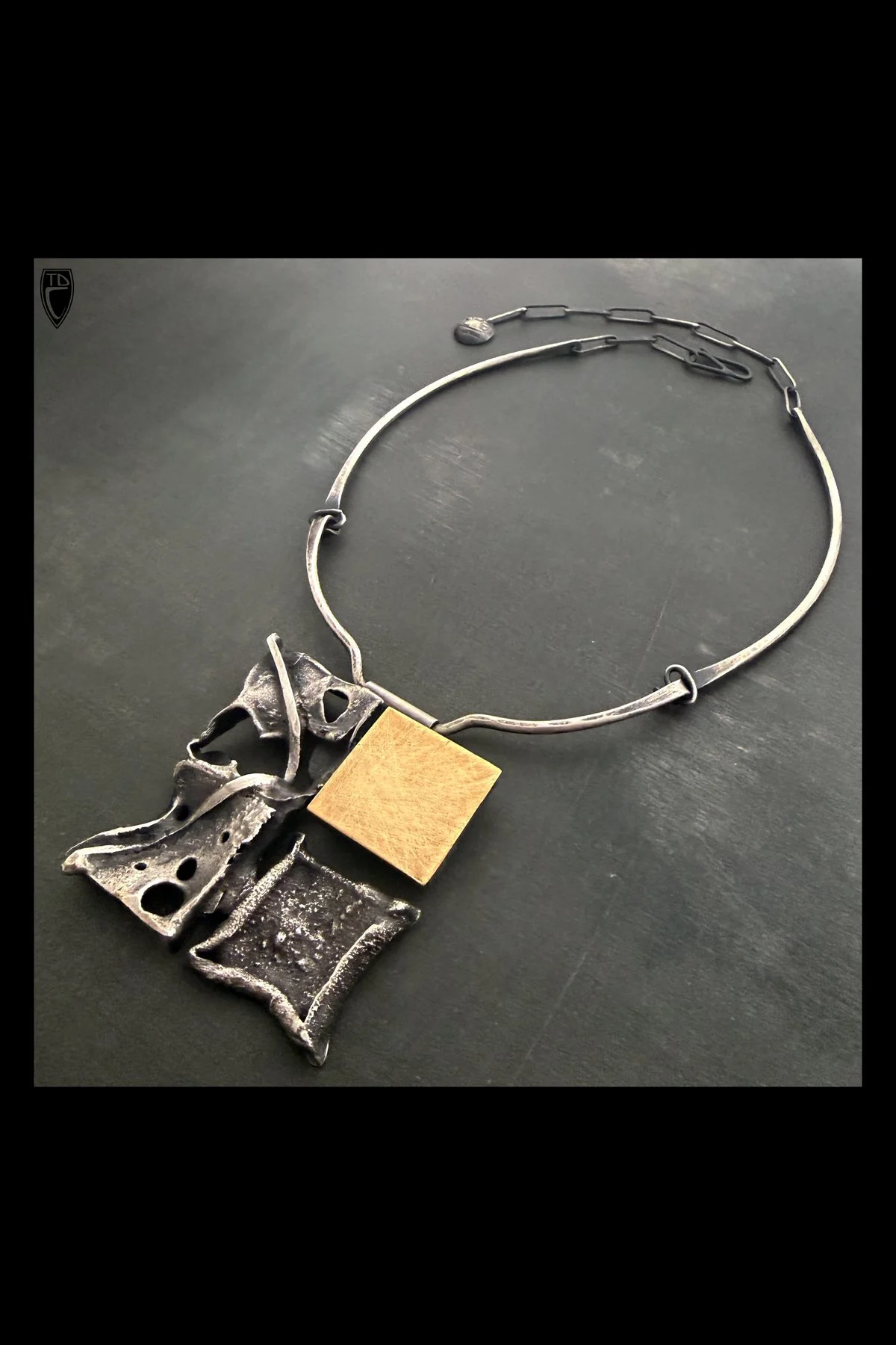 "Grid Decay, Fused, Forged Heat Collapsed and Fabricated Sterling Silver and Brass Neckpiece