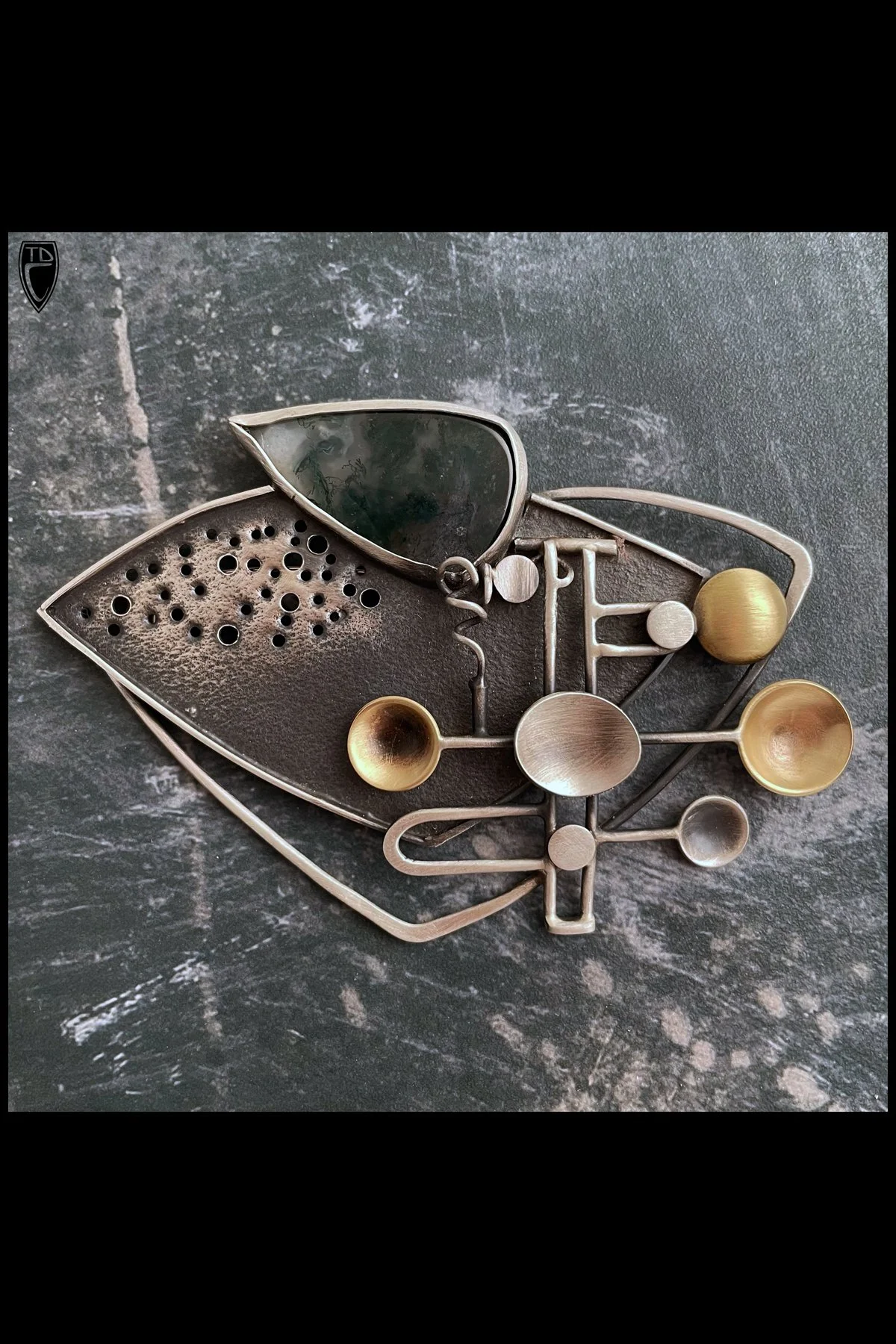 "AI", Sterling Silver, Brass, Moss Agate and Steel Brooch