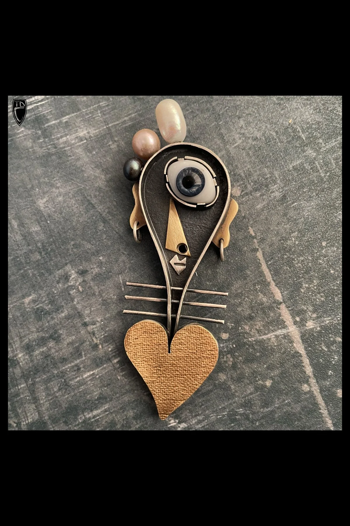 "Charlene", Sterling Silver, Brass, Pearl, Antique Glass Doll's Eye and Steel Brooch/Pendant