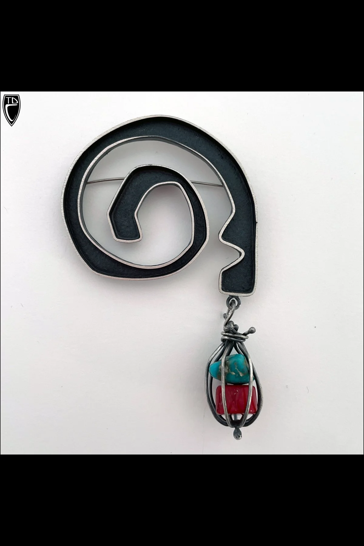 Sterling Silver "Swirl" with caged Turquoise and Coral