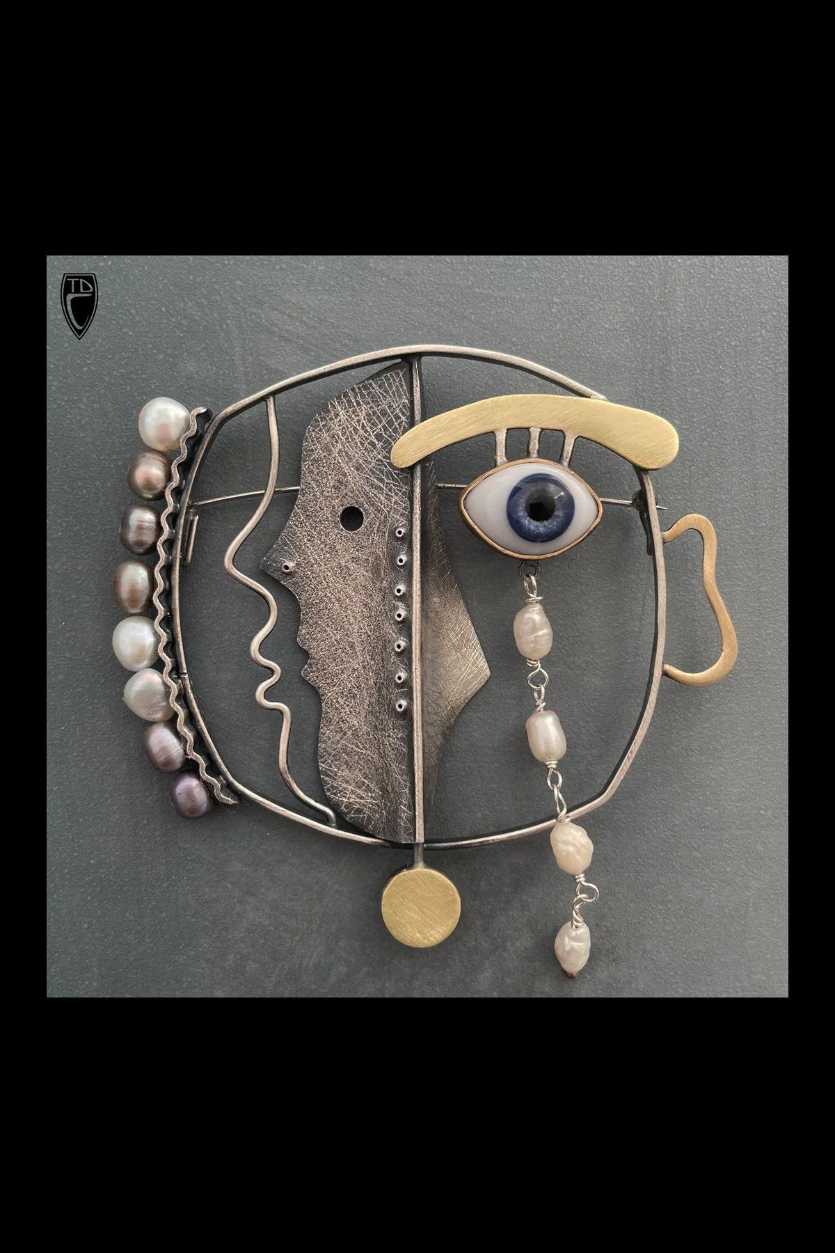 "Two Face", Sterling Silver, Brass, Bronze, Vintage Glass Eye, Pearl and Steel Brooch/Pendant