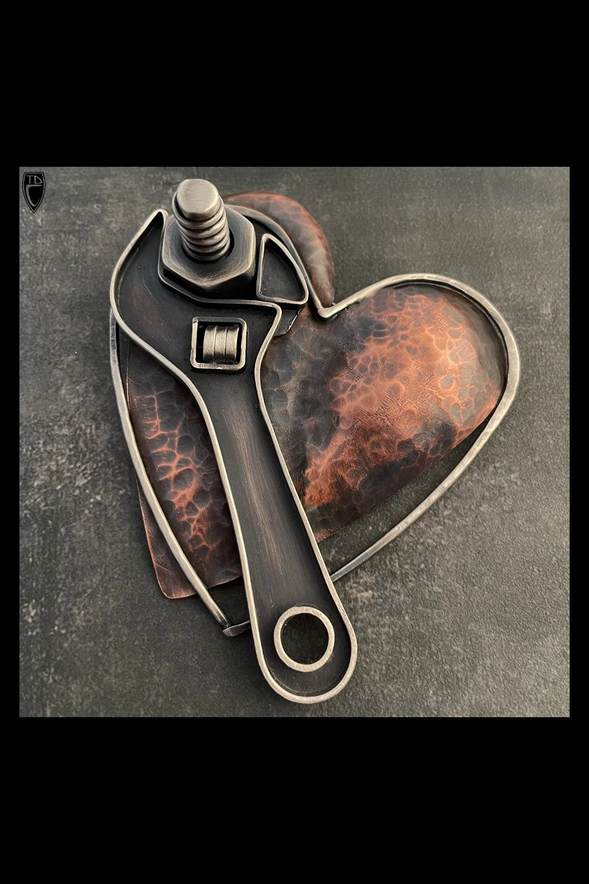"Heart Wrenching", Hollow Formed and Fabricated Sterling Silver and Hammered Copper Heart Brooch/ Pendant
