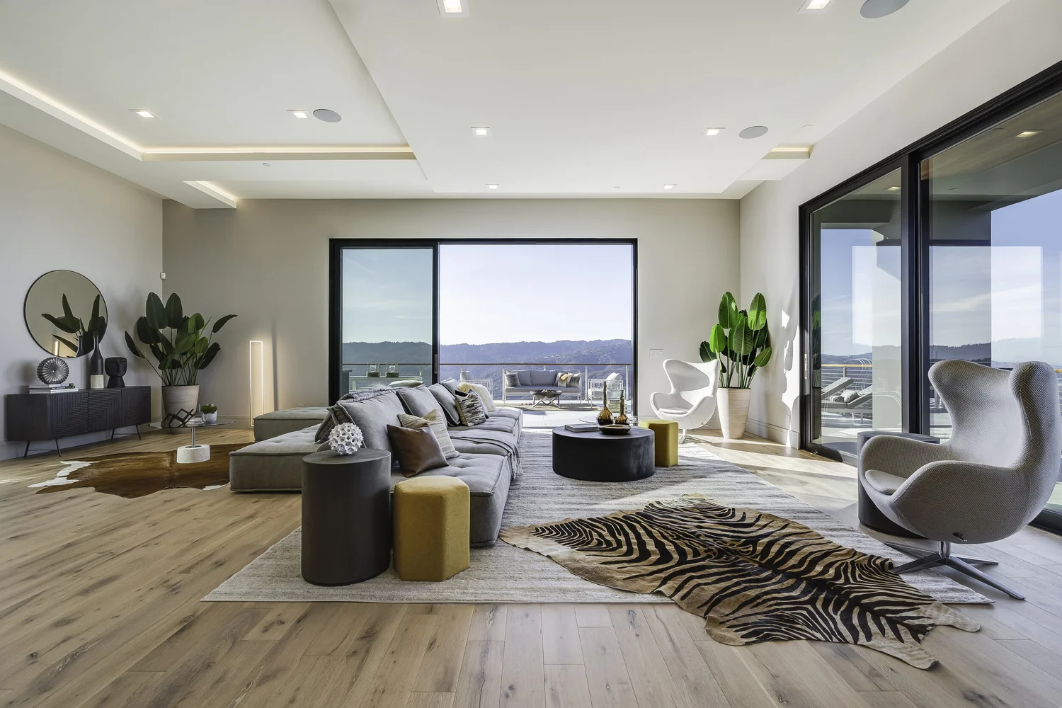 Living room with valley views, staged by Encore