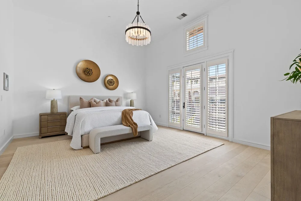 Bedroom with vaulted ceiling at Santana Row, San Jose after staging by Encore