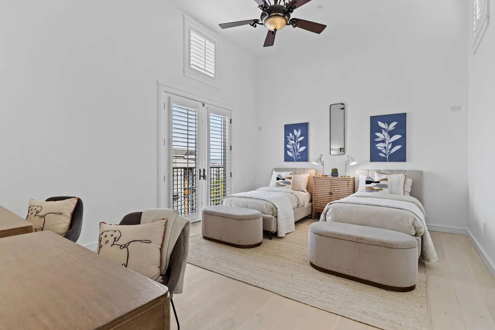 Bedroom with sitting area at Santana Row, San Jose after staging by Encore