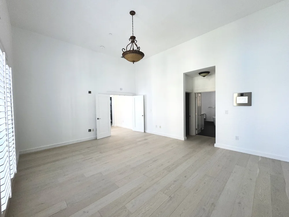 Bedroom suite at Santana Row, San Jose before staging