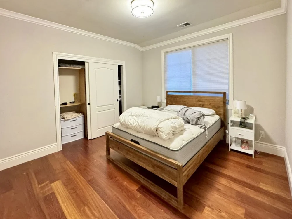 Bedroom with garden view at Benvenue Avenue, Los Altos before staging