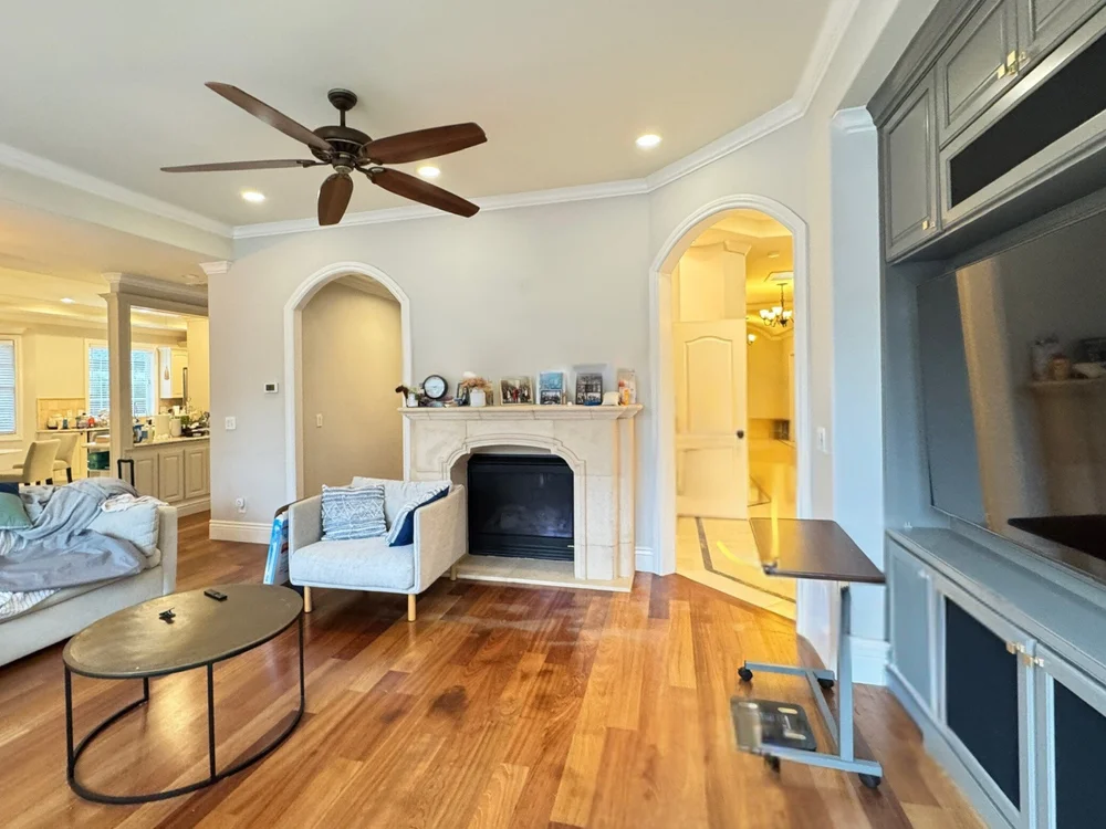 Fireplace sitting area at Benvenue Avenue, Los Altos before staging