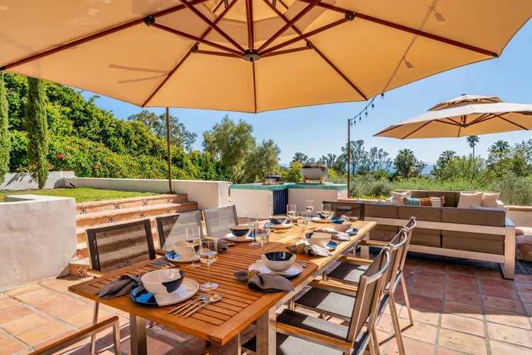 Outdoor dining terrace at 1910 Barker Pass Road, Santa Barbara