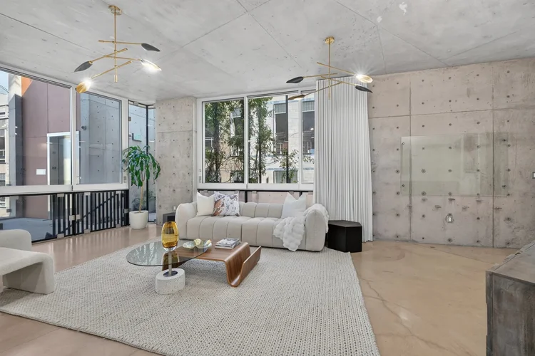 Living room and window wall at 102 University Ave #3C, Palo Alto
