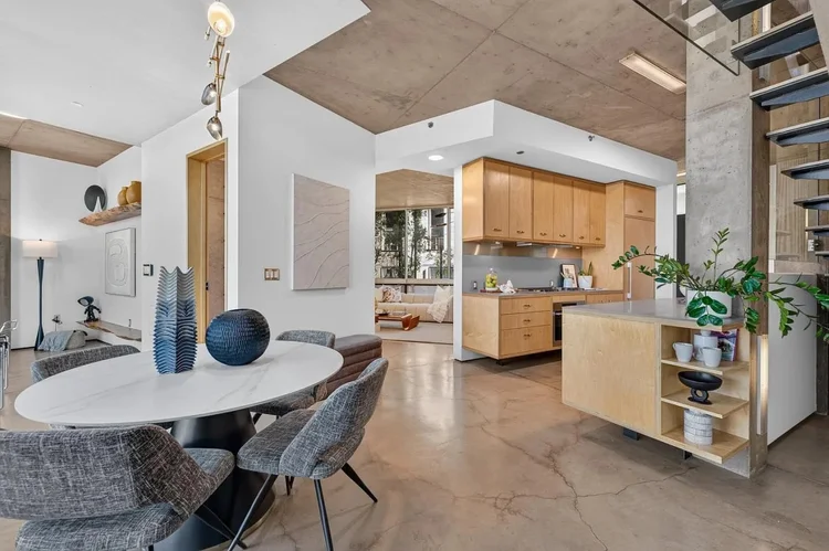 Dining area and kitchen at 102 University Ave #3C, Palo Alto