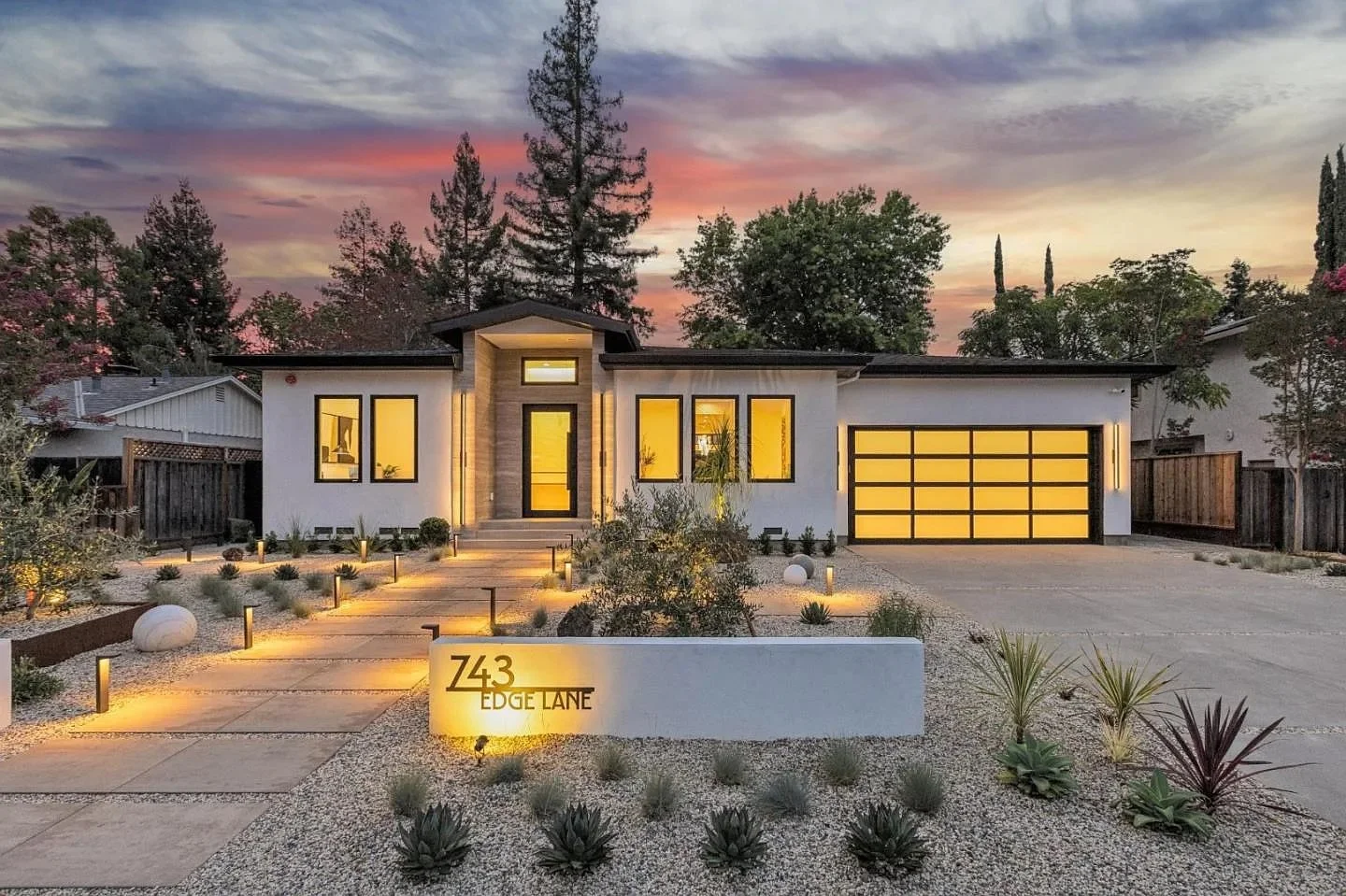 Front exterior at twilight at 743 Edge Lane, Los Altos
