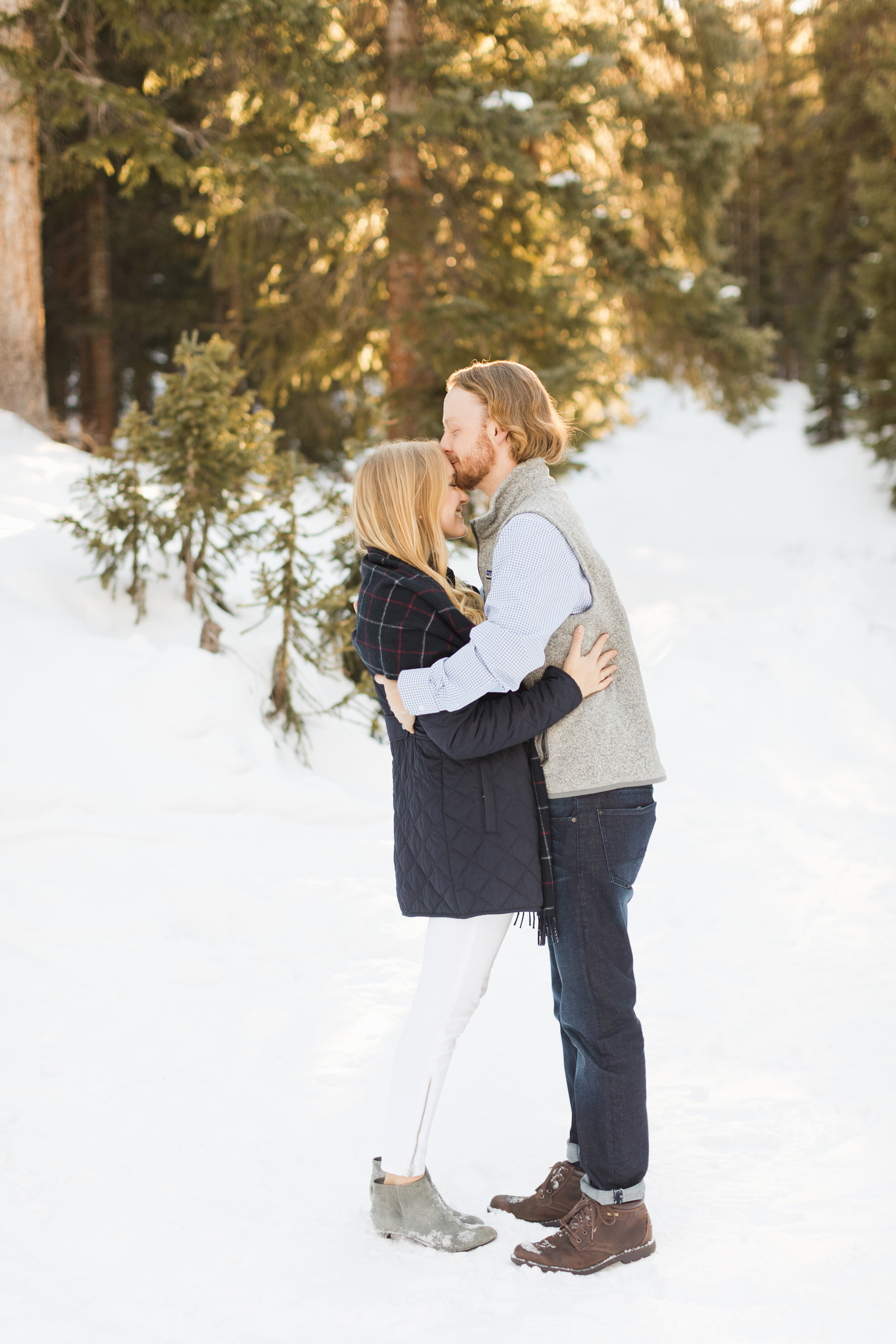 snowy-colorado-engagement-photos-in-the-forest-by-jackie-cooper-photo-05.jpg