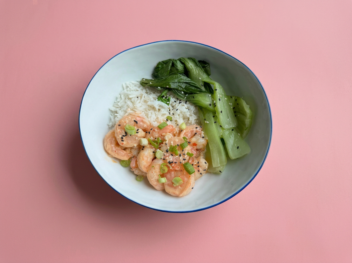 Bowl of WellFed bang bang shrimp with rice and steamed bok choy