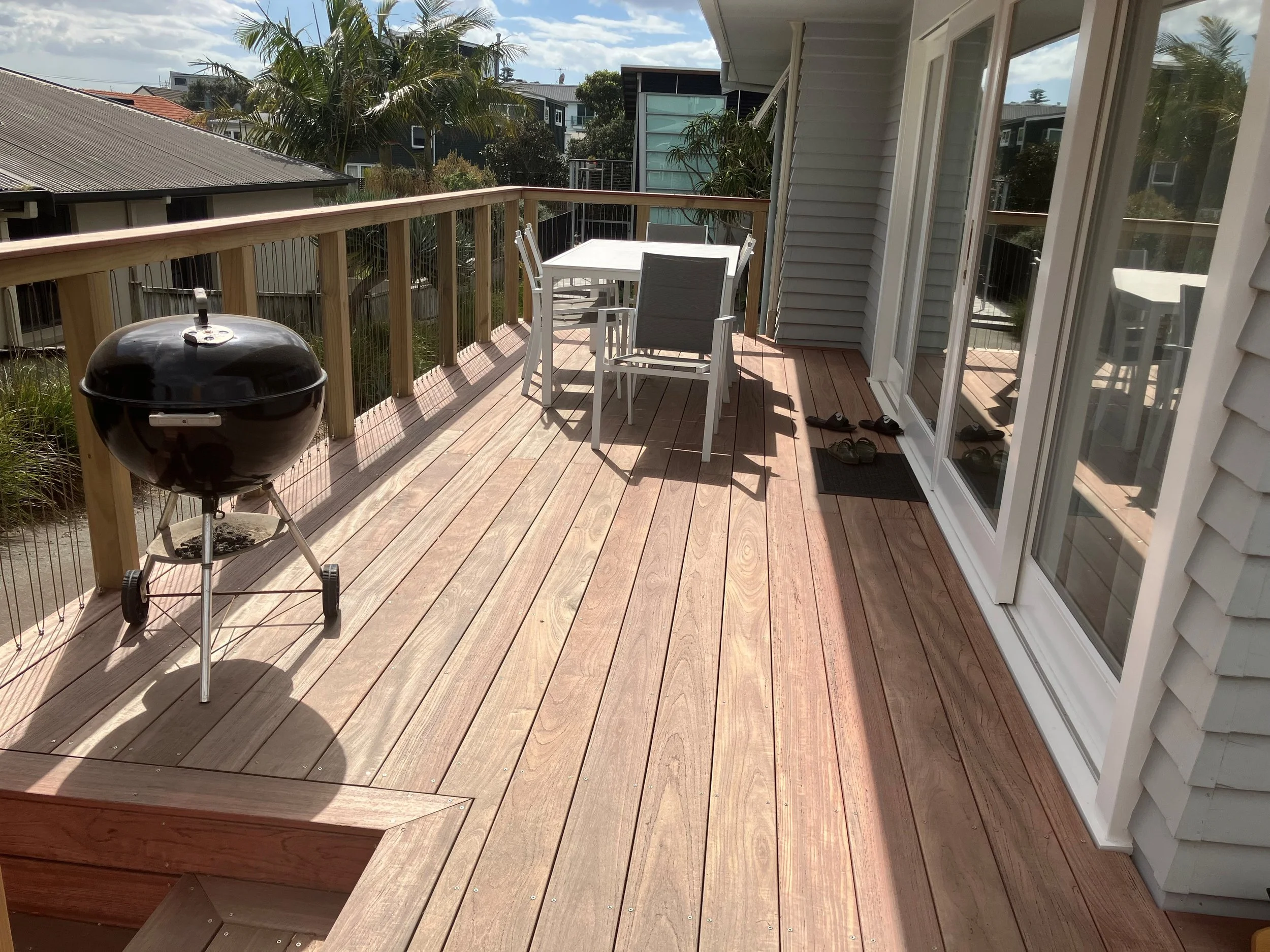 Purpleheart deck with wire ballustrade