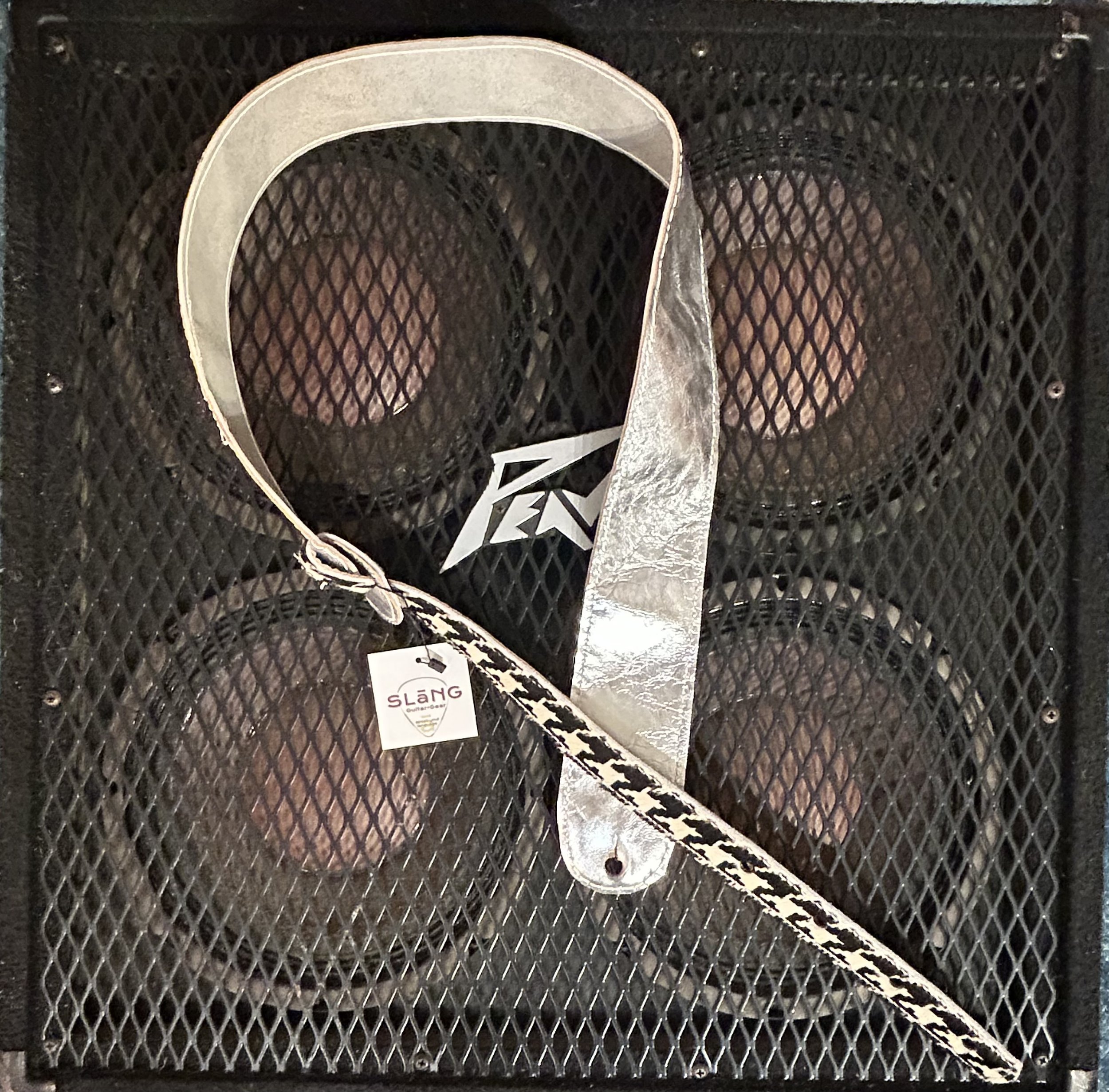 Reversible Silver cowhide to aged white cowhide guitar strap by SLāNG. (GS-0053)