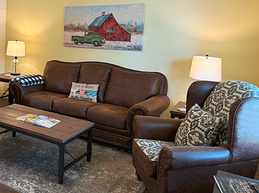 The Cottages on the Prairie Farmhouse Living Room.