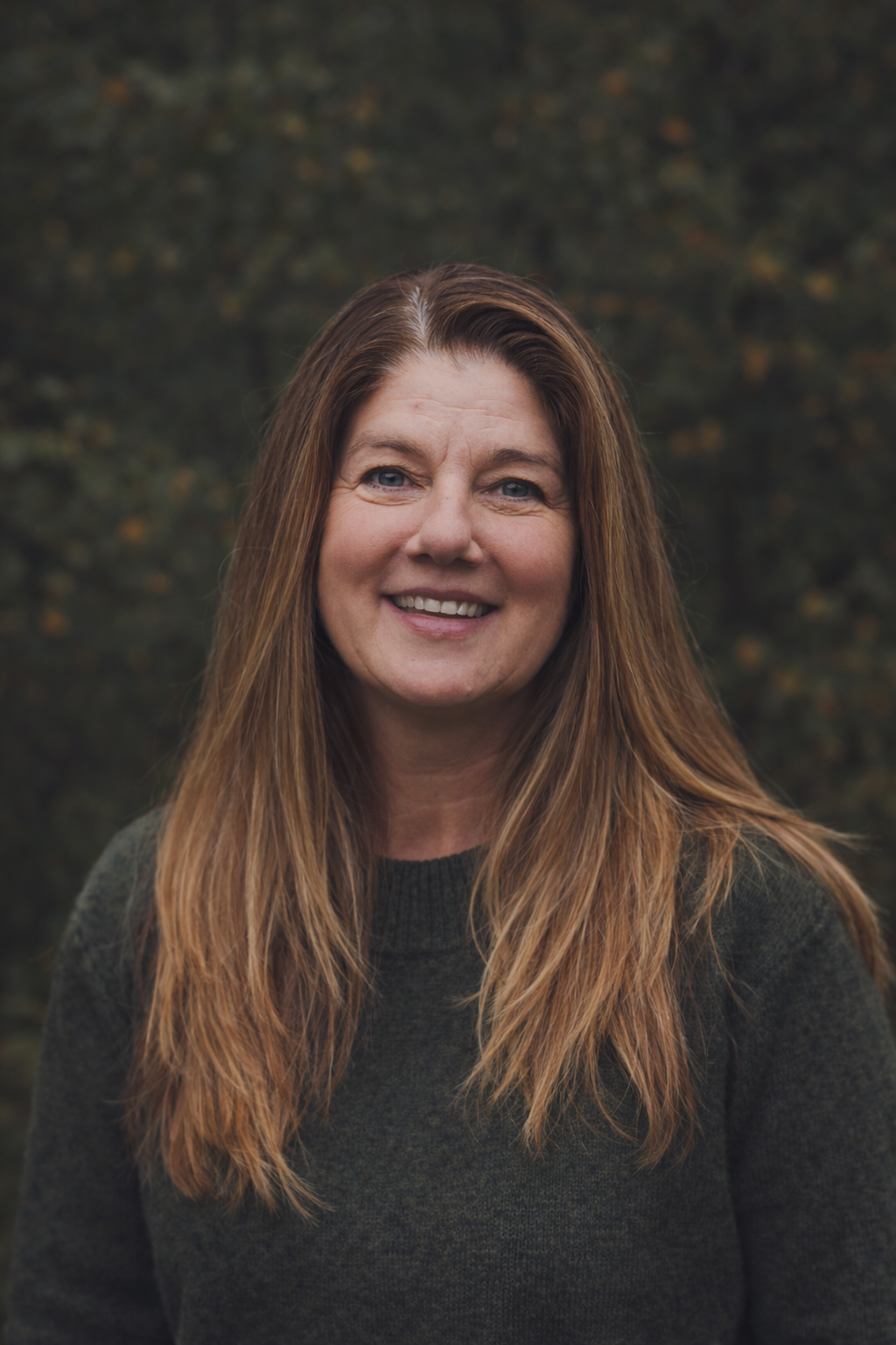 Trish founder of Heather and Stone in woods