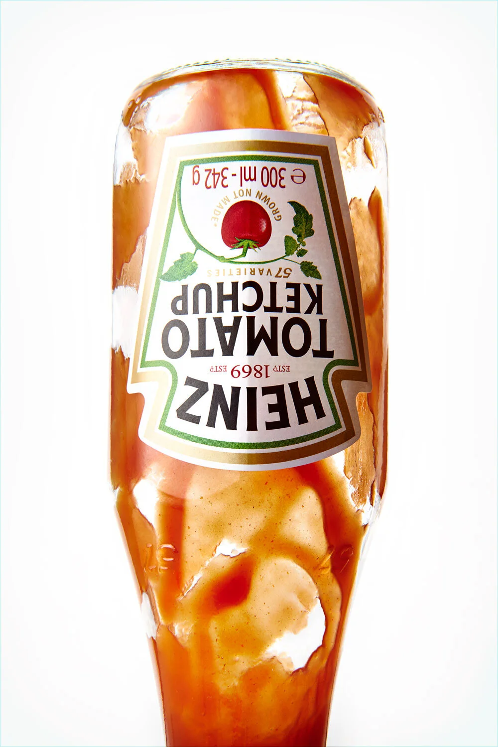 Heinz Ketchup Bottle. Glass packaging image shot upside down as a beautiful packaging advertising shot.