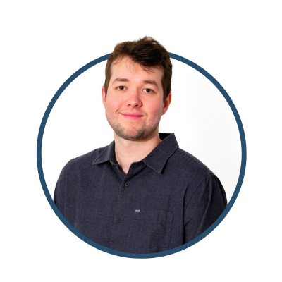 Portrait of a person in a black shirt with a neutral expression, inside a circular frame on a white background.
