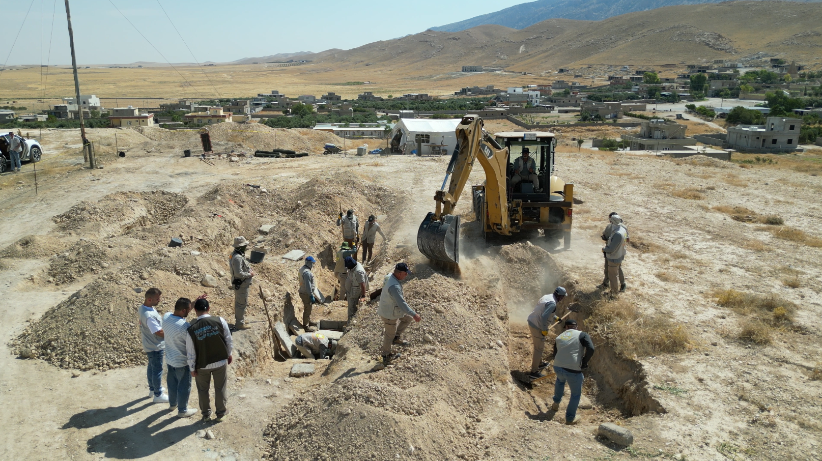 Mazar Sharfadine mass grave exhumation (6).png