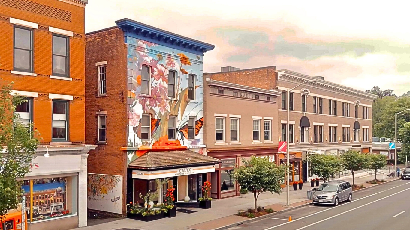 Downtown Great Barrington storefronts and mural outside Calyx Berkshire dispensary