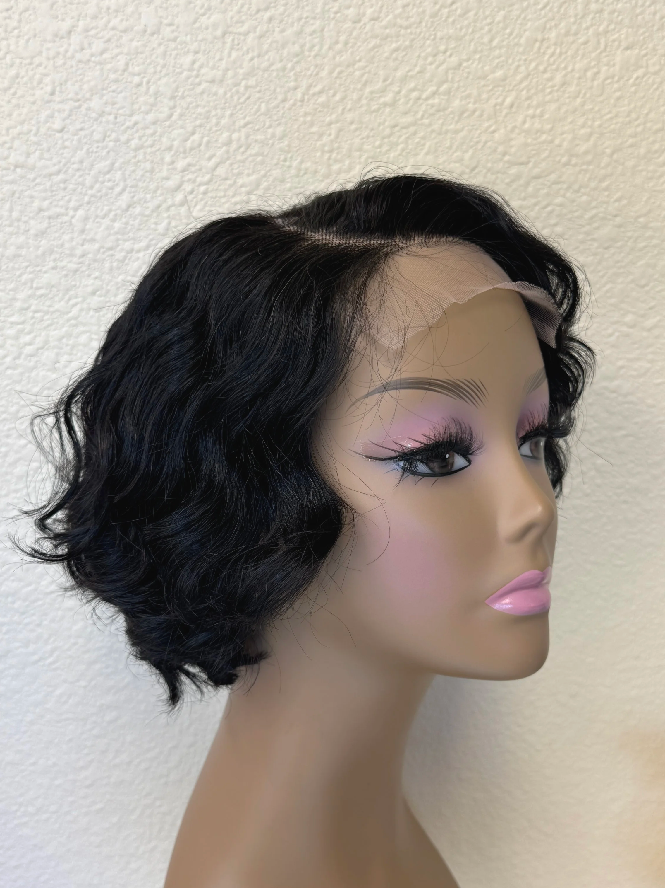 chin-length-loose-wave-bob-1b-4x4-closure-side-offblackhair.png