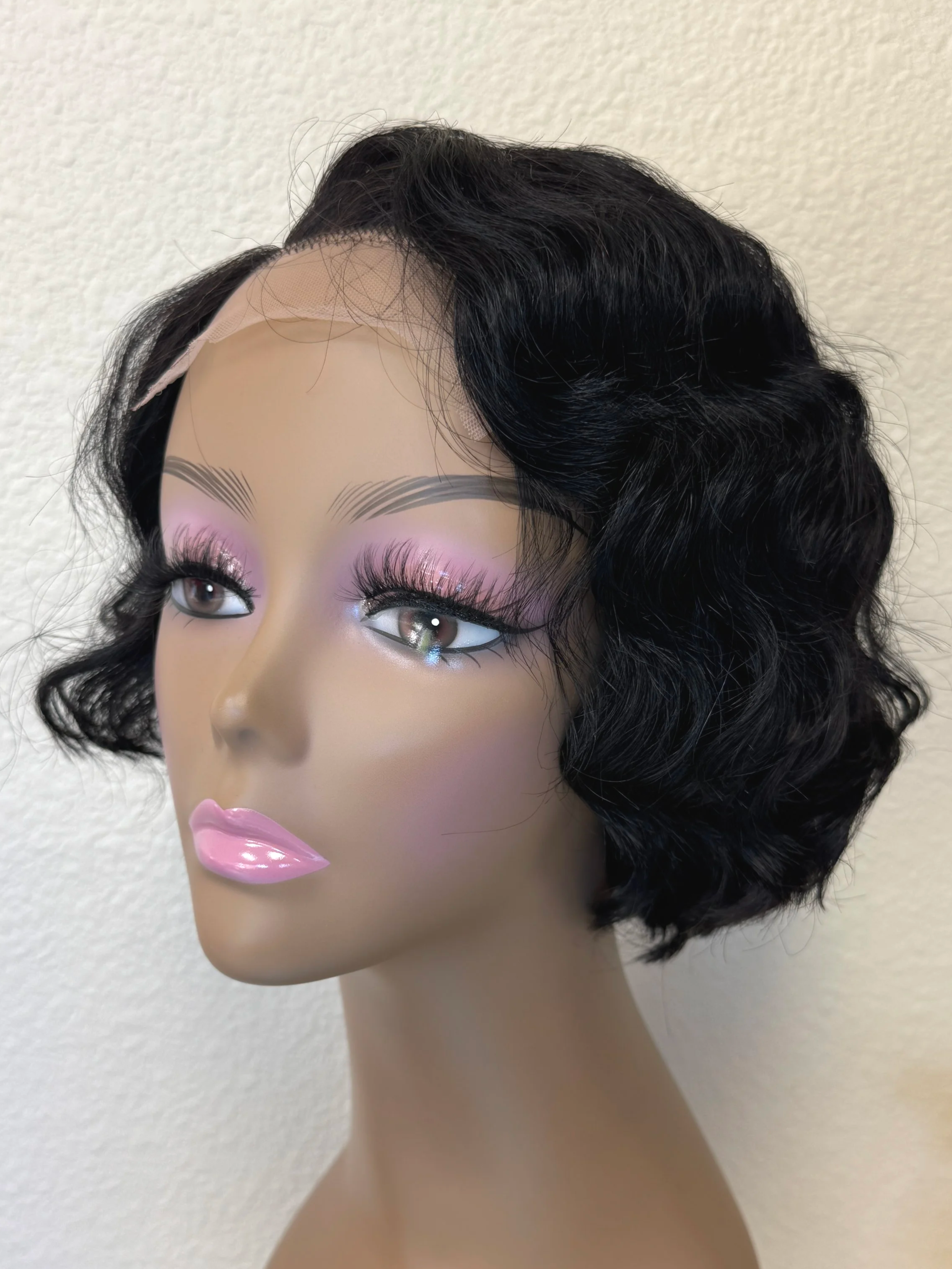 chin-length-loose-wave-bob-1b-4x4-closure-side-offblackhair1.png